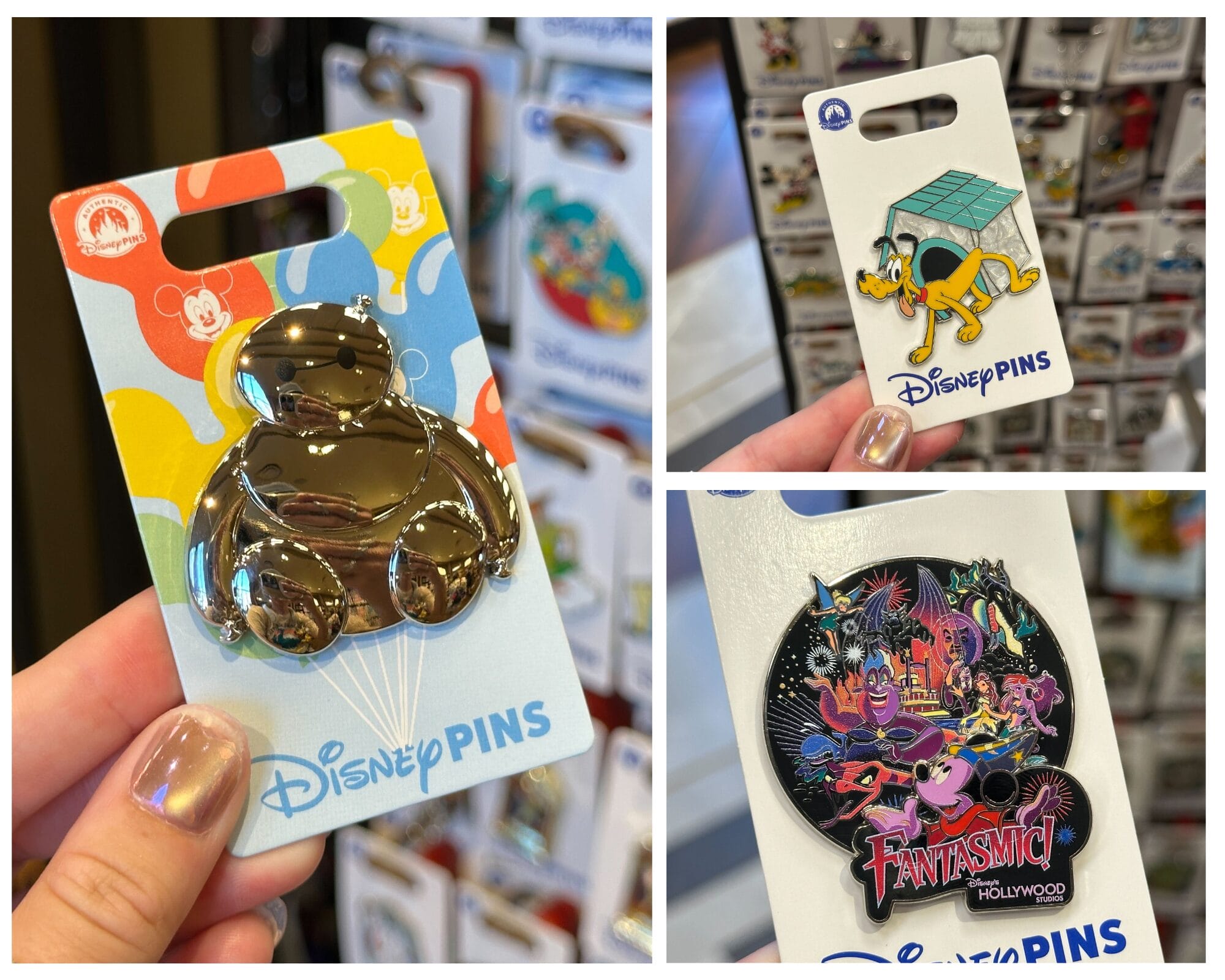 Three new pins—Baymax, Pluto with a doghouse, and Fantasmic!—held before a Disney's Hollywood Studios pin display.