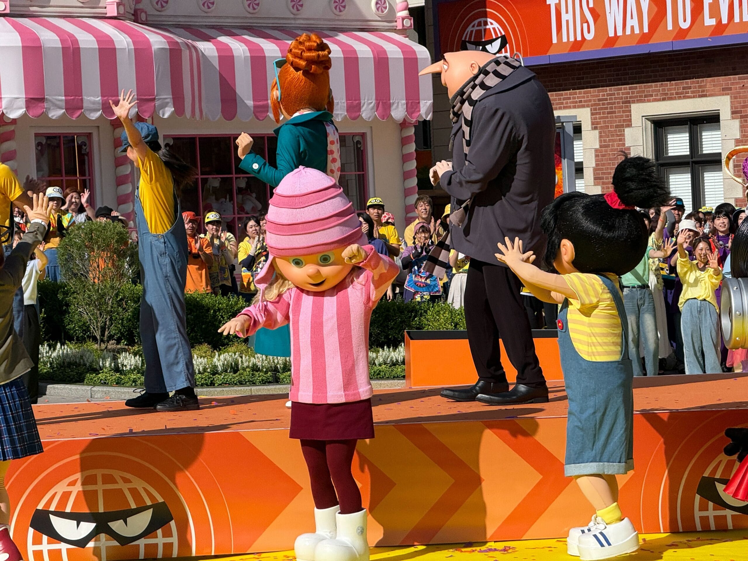 Costumed characters from "Despicable Me" entertain crowds during the lively Grand Opening Ceremony at Minion Park.