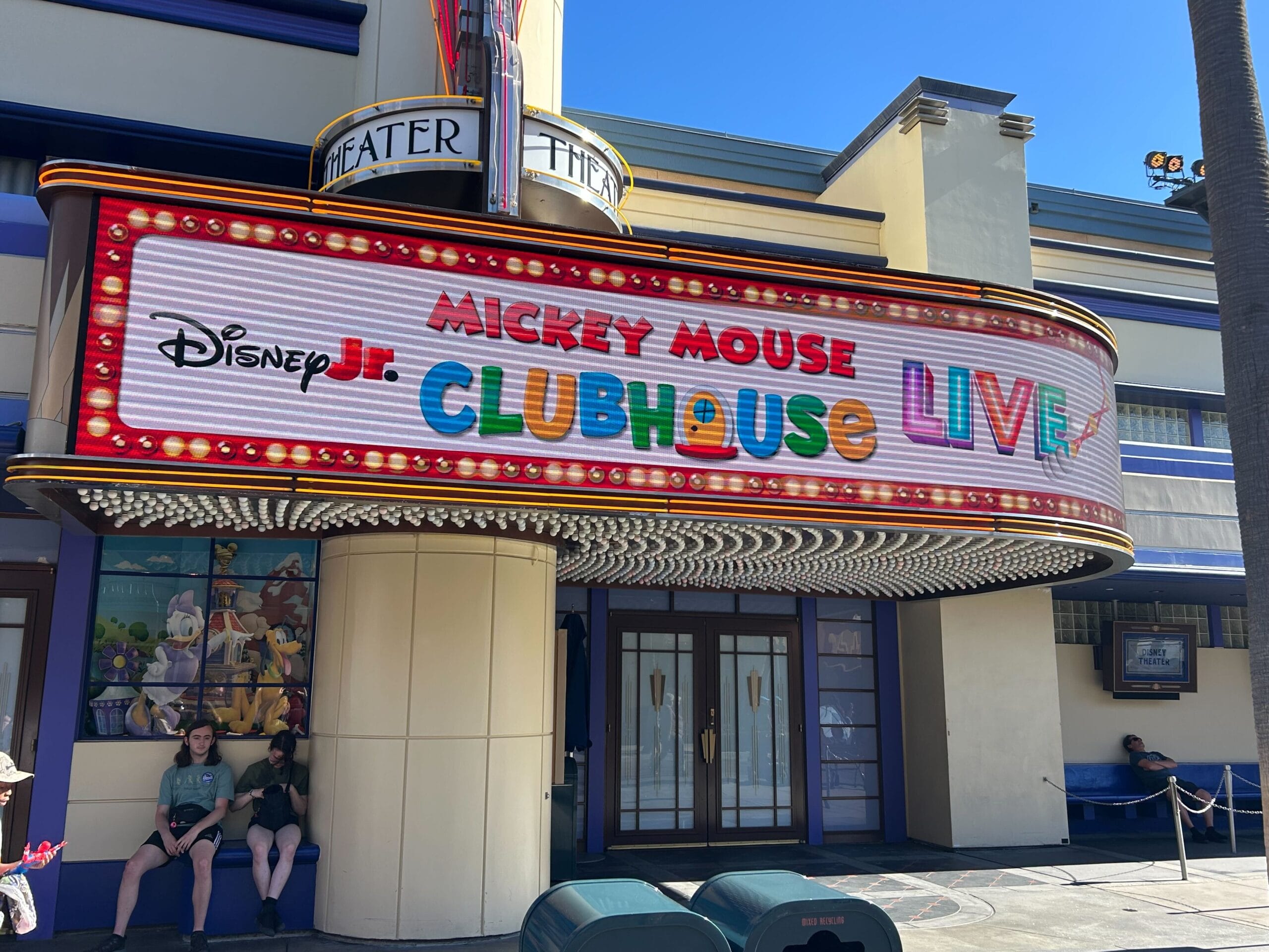 Marquee reads “Disney Jr. Mickey Mouse Clubhouse Live!” at Disney California Adventure on a sunny day.