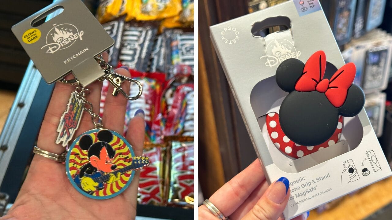 A hand holds Mickey and Minnie merch—a Disney keychain and phone grip—at Disney's Hollywood Studios store display.