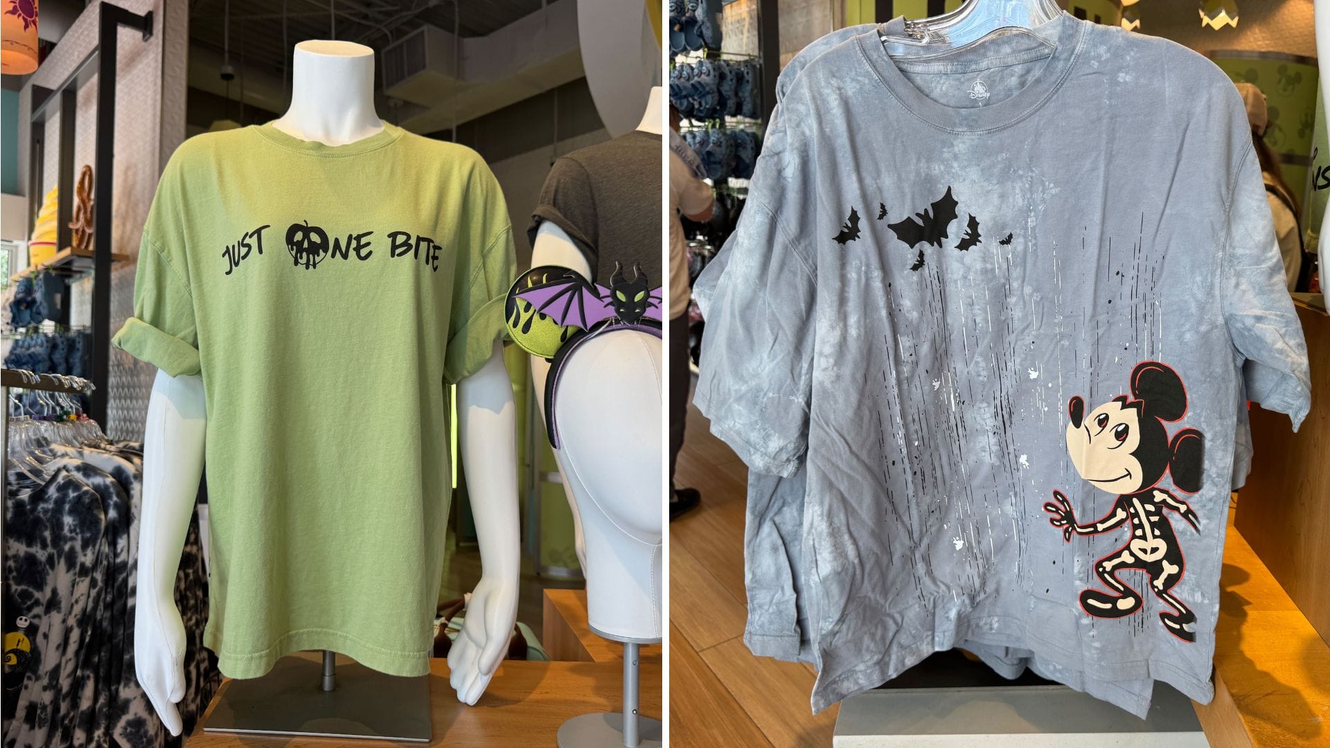 Two Halloween T-Shirts: green with Snow White's "Just One Bite" and gray with skeleton Mickey Mouse on display.