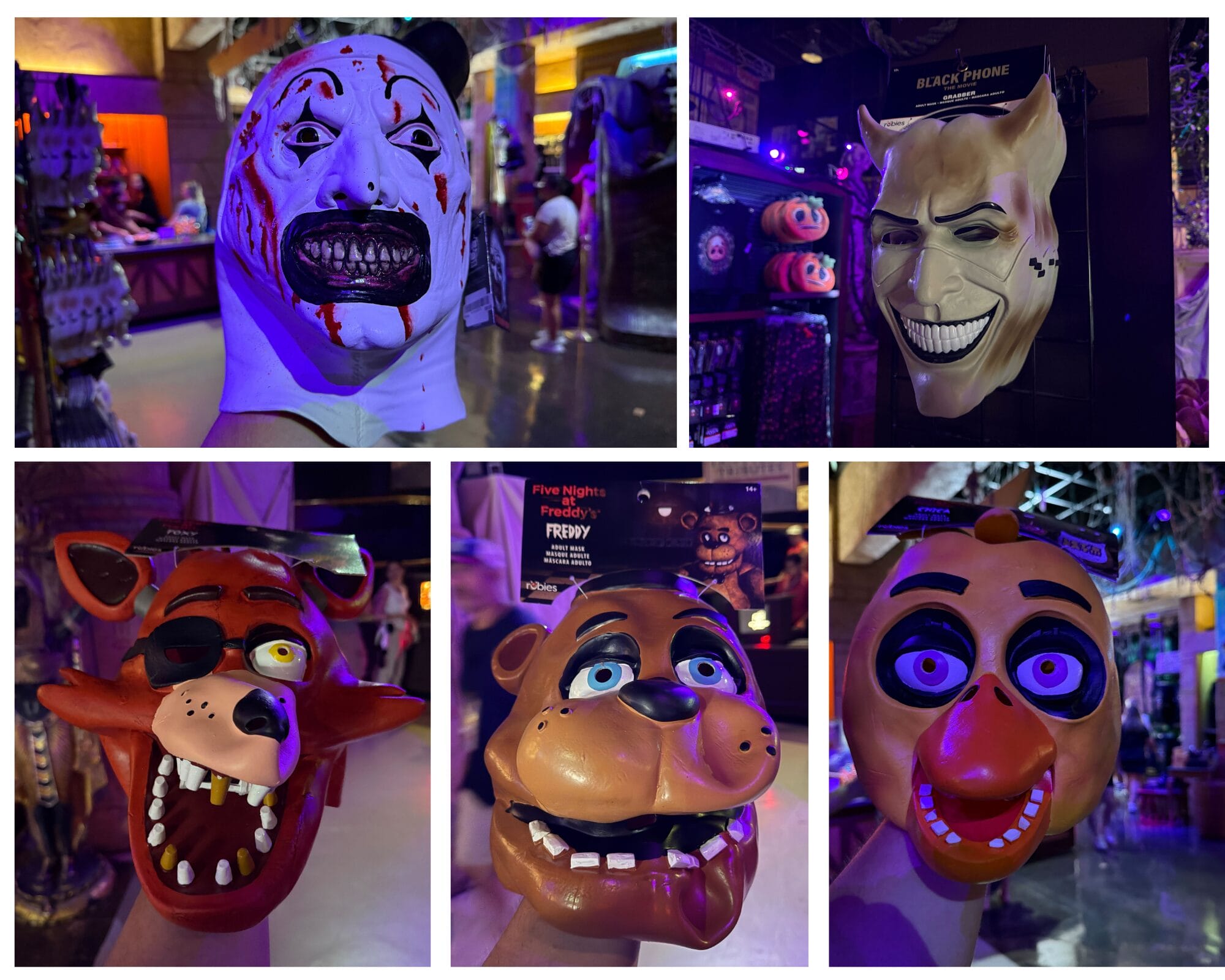 Five haunting masks of scary cartoon characters displayed with colorful lighting at Universal Orlando Resort for Halloween.