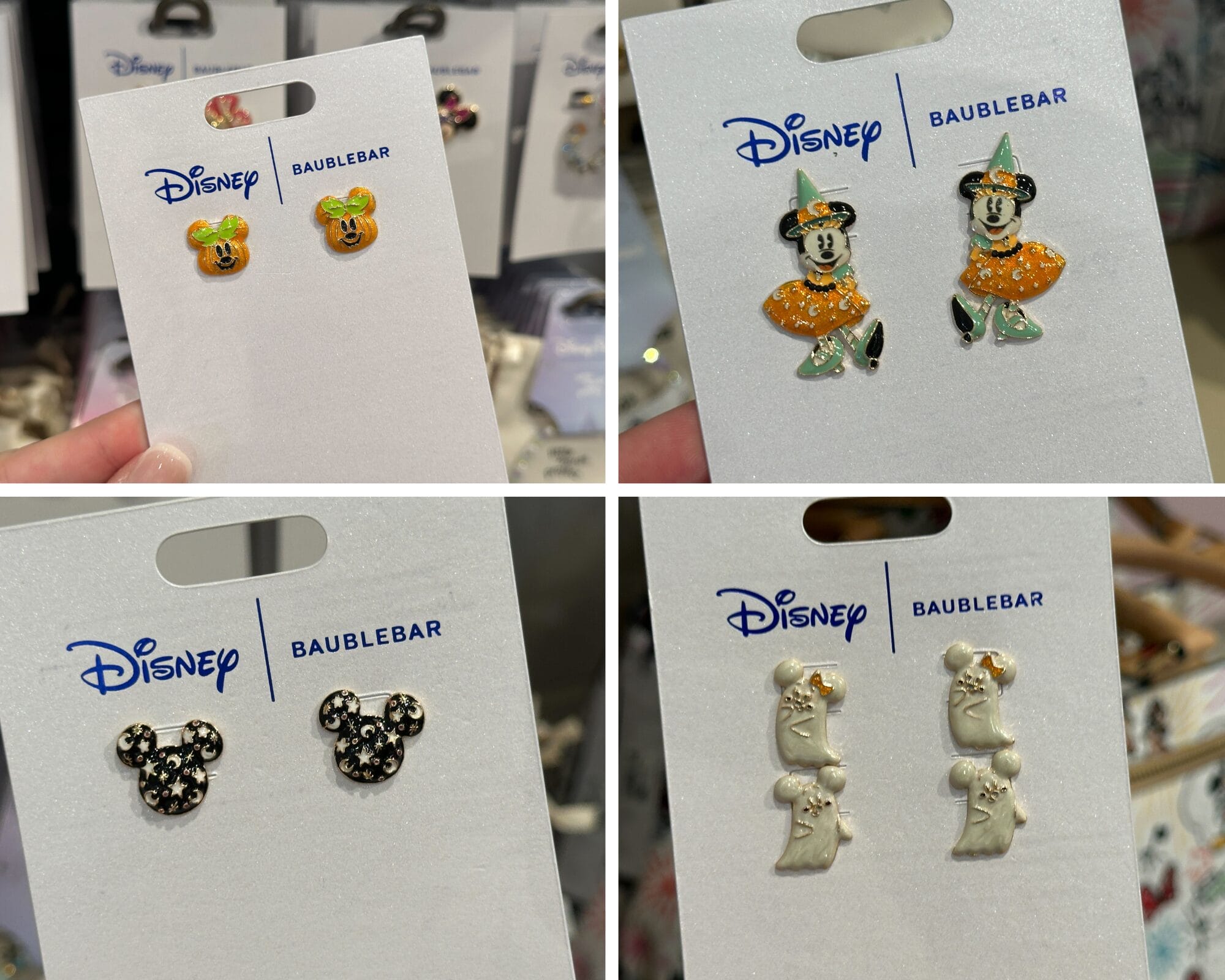 Four sets of Disney Halloween earrings, featuring Mickey, Minnie, and ghost designs, displayed on white cards.