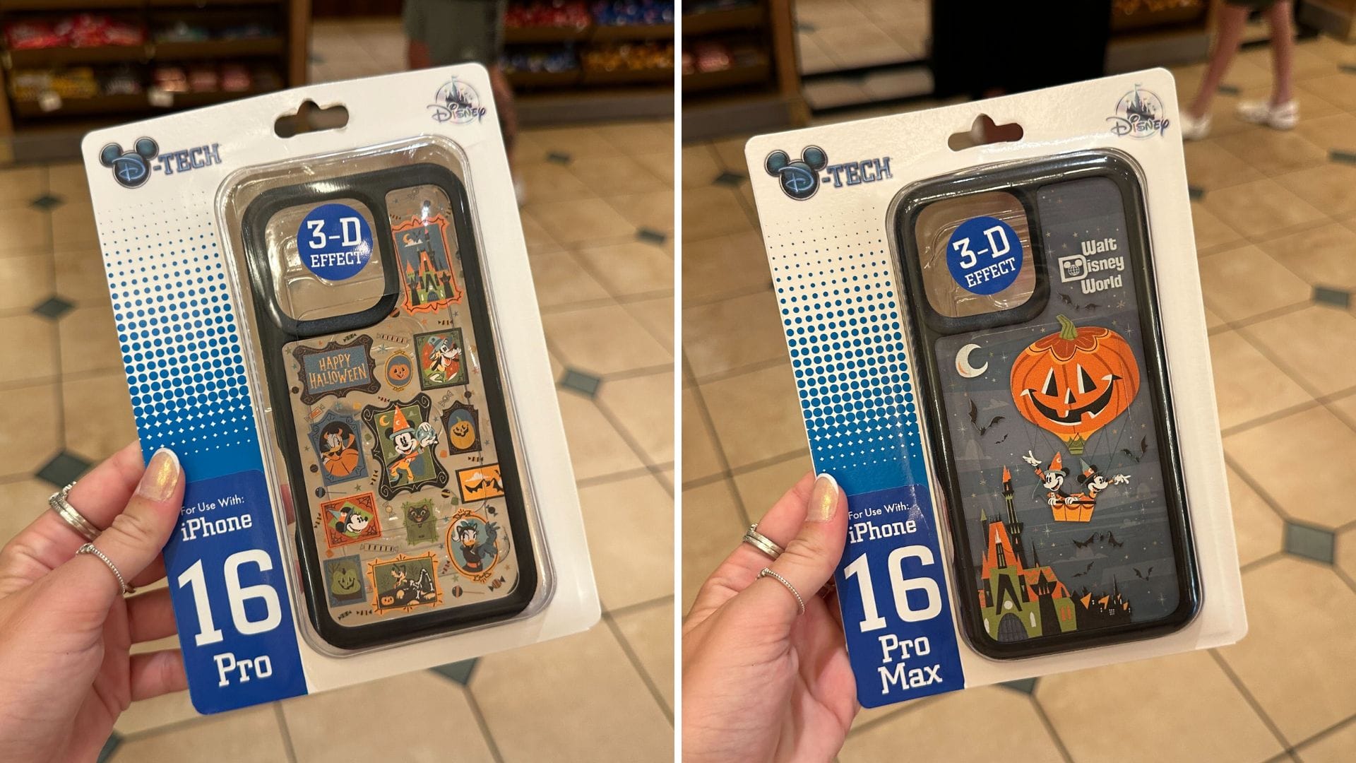 Two hands hold Disney-themed Halloween Phone Cases for iPhone 16 Pro Max, featuring colorful spooky designs in store packaging.