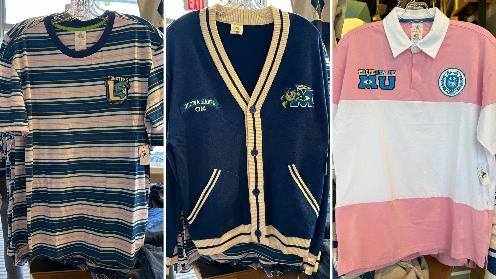 Three Monsters University shirts on display: a striped tee, blue Walt Disney World cardigan, and pink and white polo.