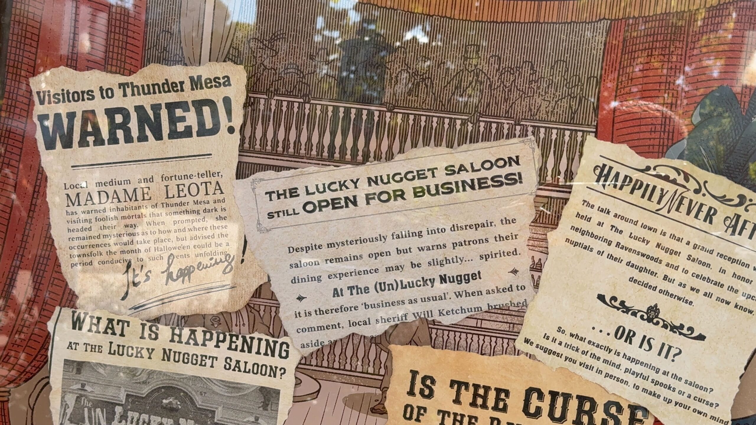 A collage of vintage-style clippings about the Unlucky Nugget Saloon and Phantom Manor in Disneyland Paris.