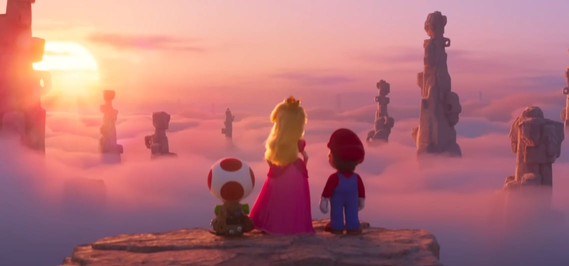 Toad, Princess Peach, and Mario overlook stone pillars at sunrise—a scene fit for a Super Mario Bros. Movie sequel.