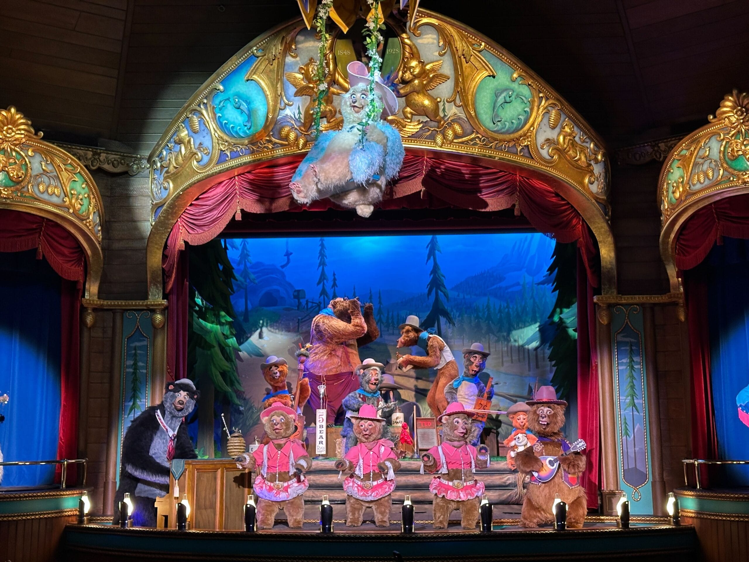 Animatronic Country Bear performers, including Teddi Barra, star in a colorful Musical Jamboree onstage.