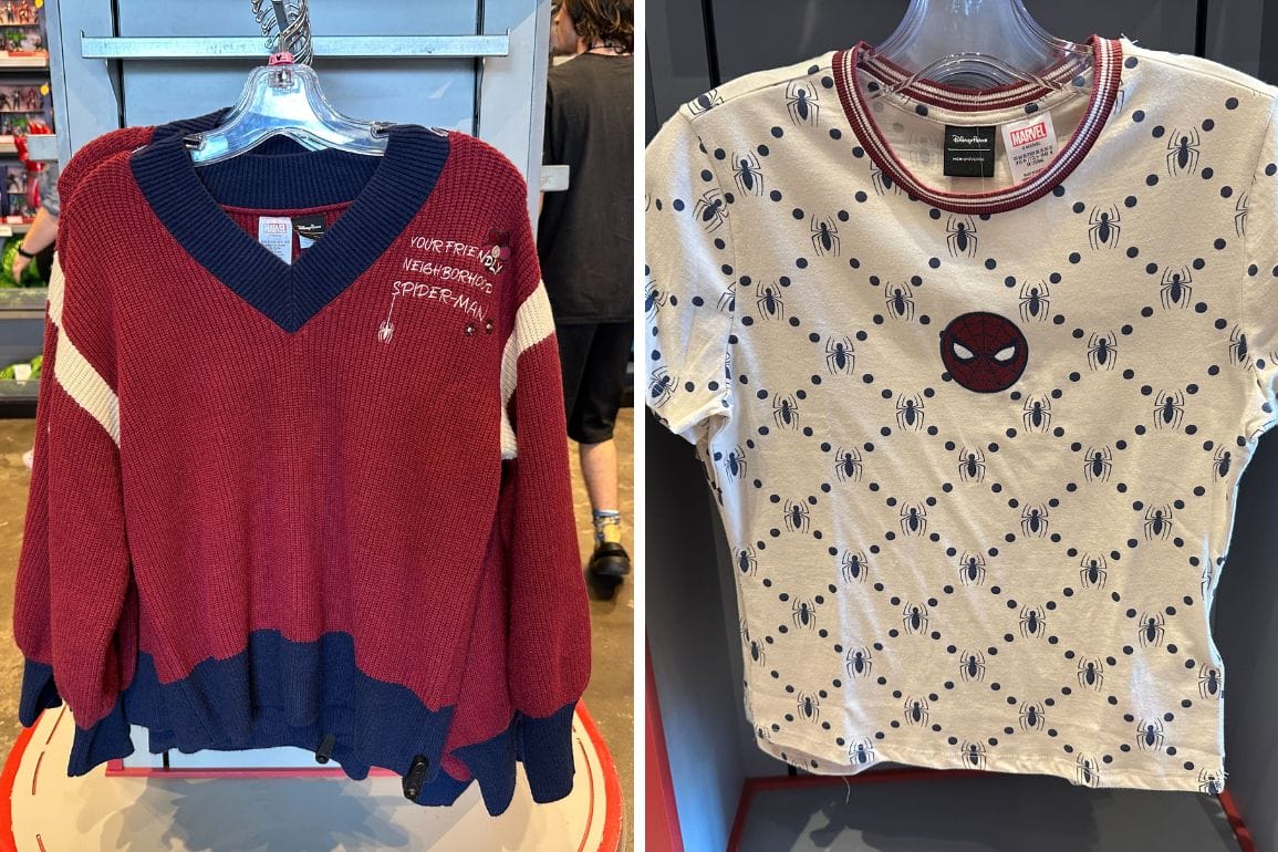 Spider-Man sweaters and tees by Her Universe on hangers at Disney World, home to Cinderella Castle, unlike Anaheim’s Sleeping Beauty.