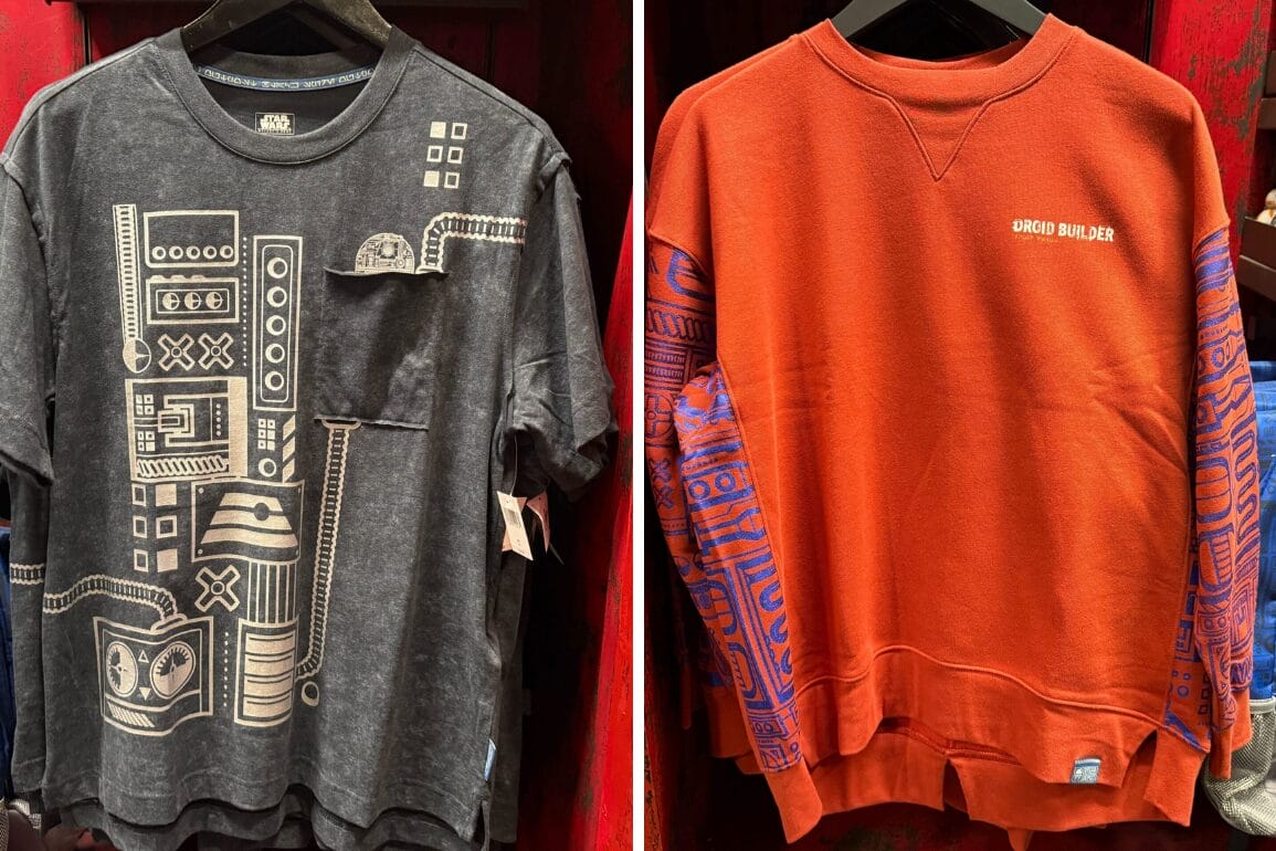 Two Droid Depot shirts at a Disney park: one black with robot art, one orange with “DROID BUILDER”—no castles visible.