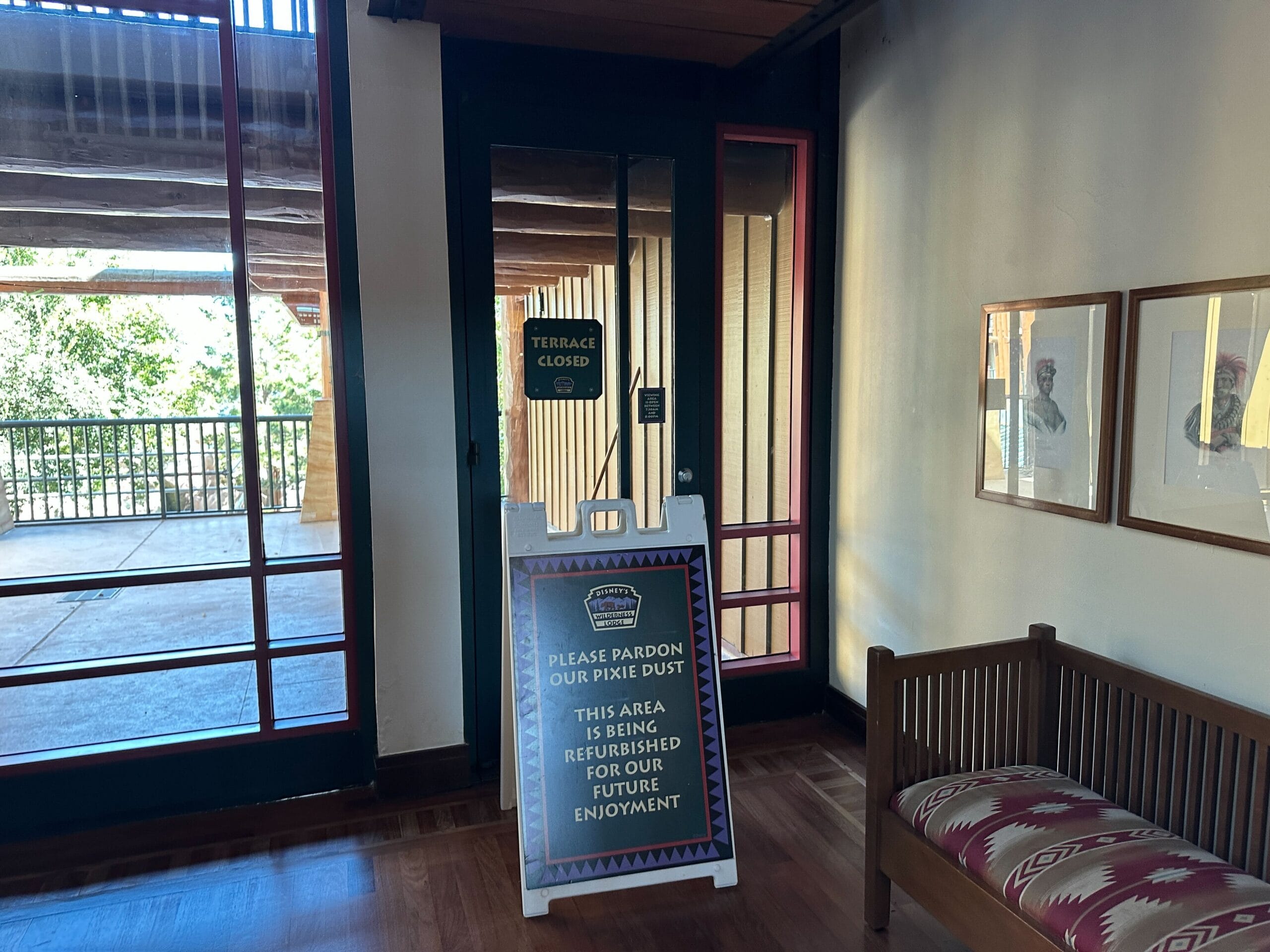 An indoor sign at a Disney park reads, "Terrace closed. Area being refurbished for your future enjoyment," Disney style.