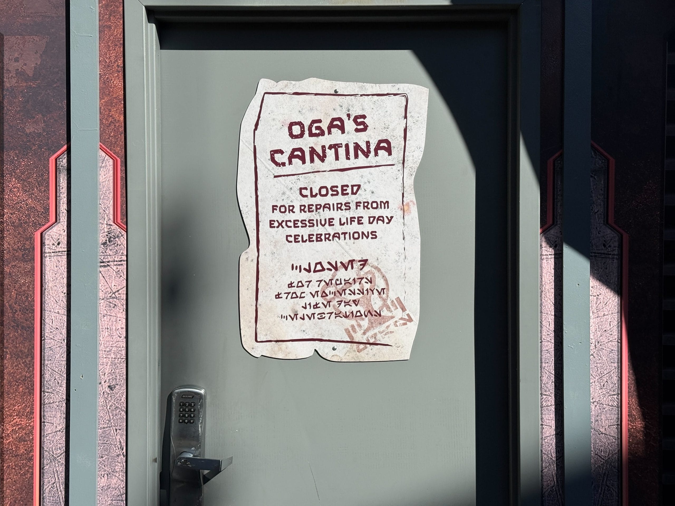 Oga's Cantina is also closed for refurbishment. A sign on the door reads "Closed for repairs from excessive Life Day celebrations."