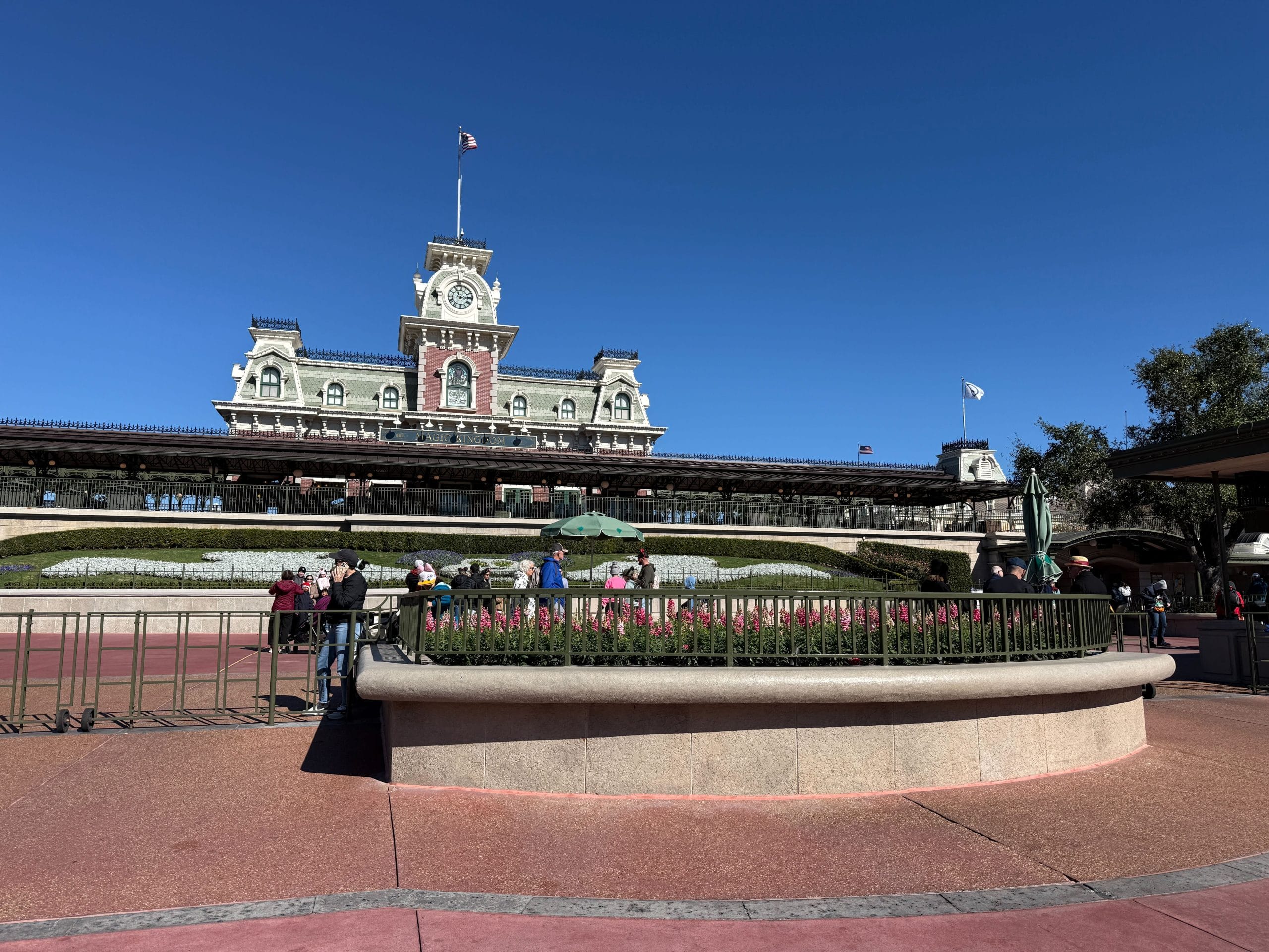 This area of the Magic Kingdom entrance is also missing the Mickey and Minnie holiday topiaries.