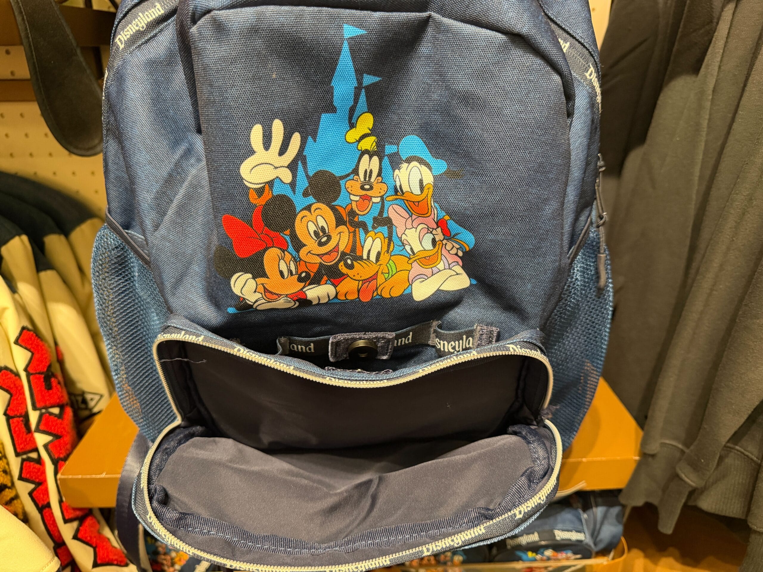 Front pocket of Mickey and Friends backpack.