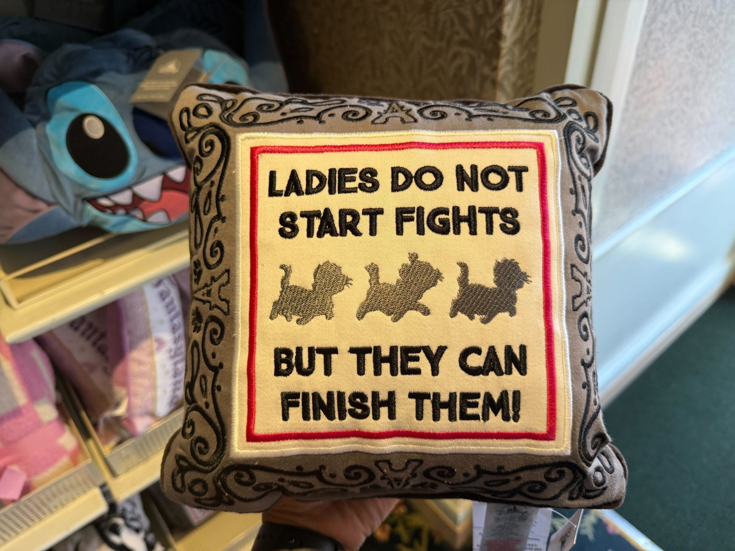 Gray Aristocats throw pillow with the text "Ladies do not start fights but they can finish them!"