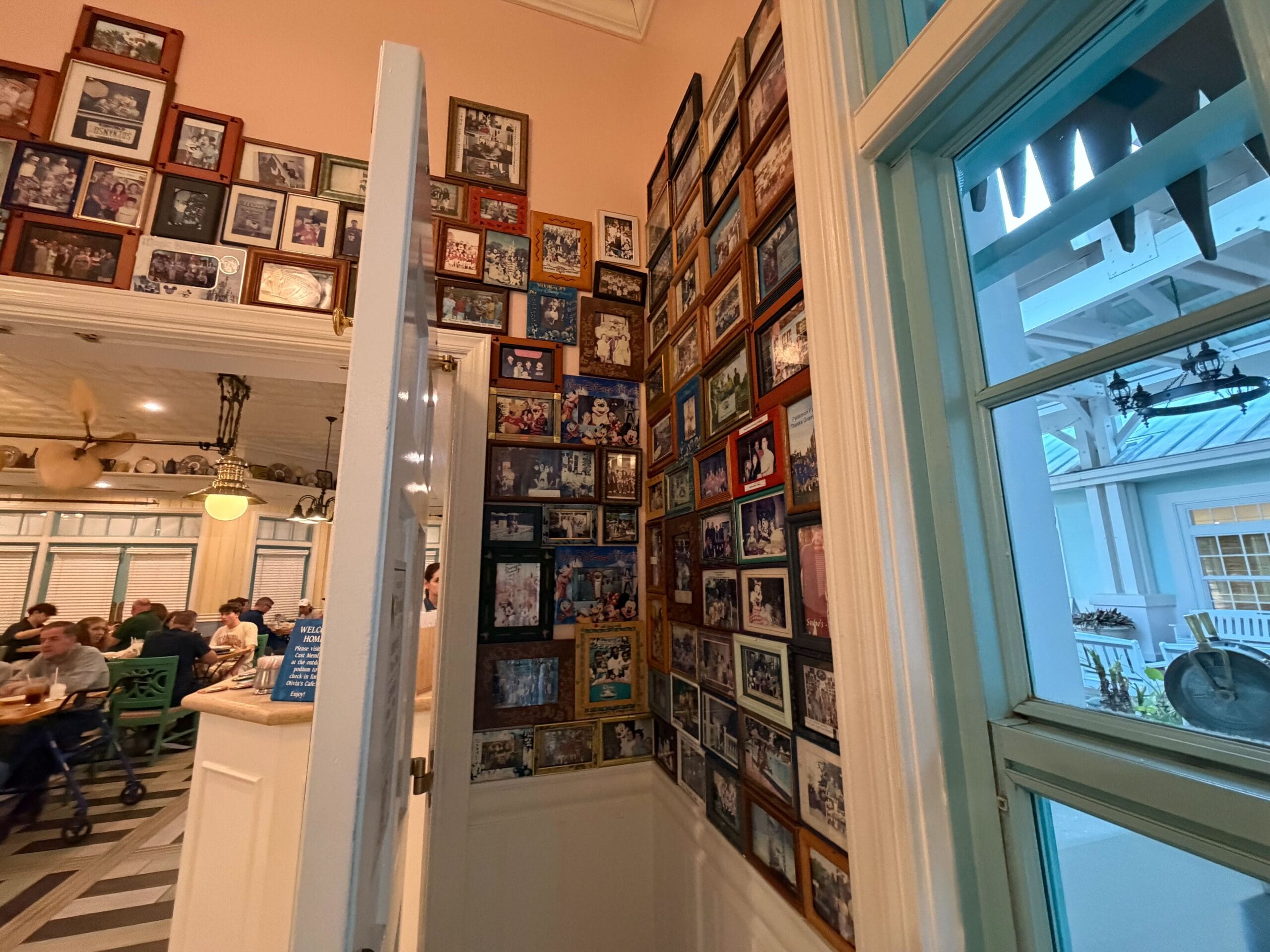 The DVC photo wall at Olivia's Cafe in Disney's Old Key West Resort in Walt Disney World