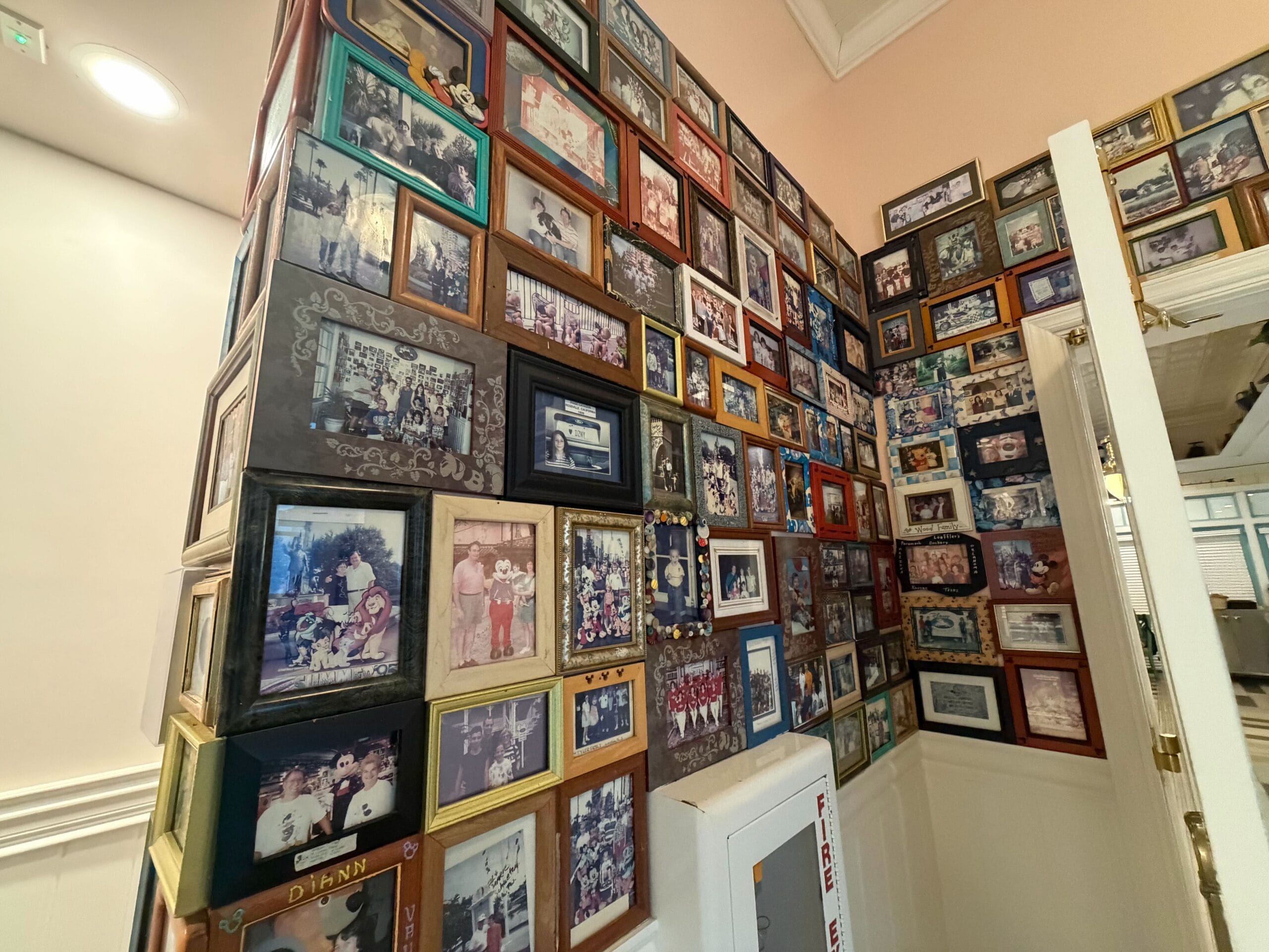 The DVC photo wall at Olivia's Cafe in Disney's Old Key West Resort in Walt Disney World
