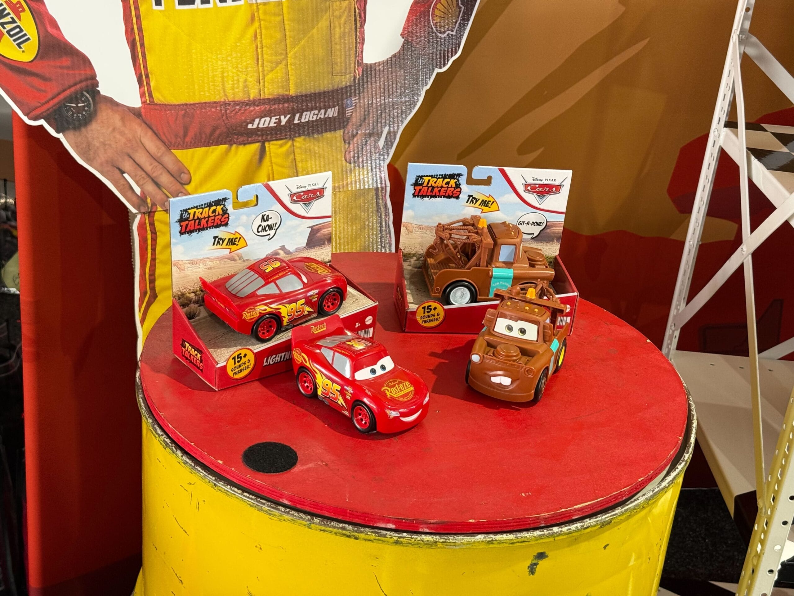 Display of Cars 20th Anniversary merchandise at Daytona 500 2026