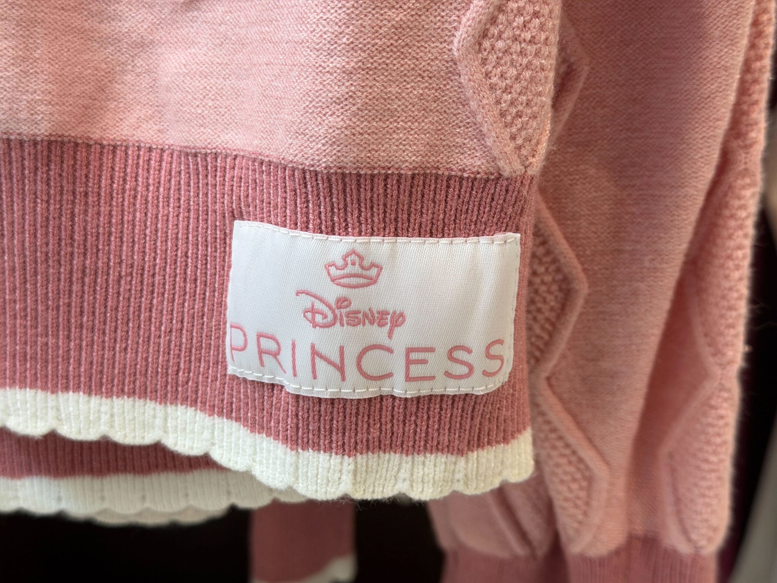 Close-up of hem of Disney Princess Sweater.