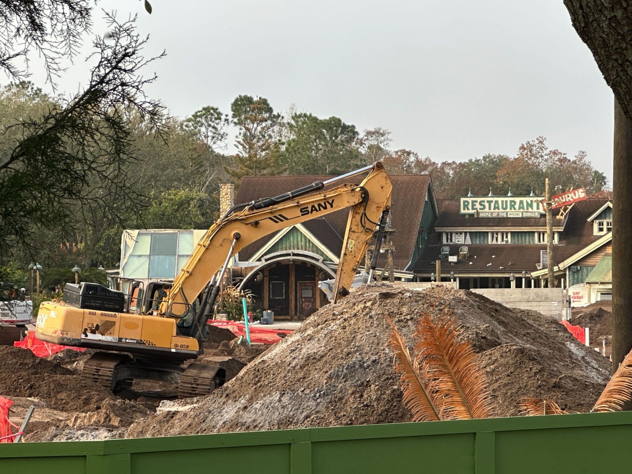 Crews Top Off Encanto Ride Building in Tropical Americas at Disney’s ...