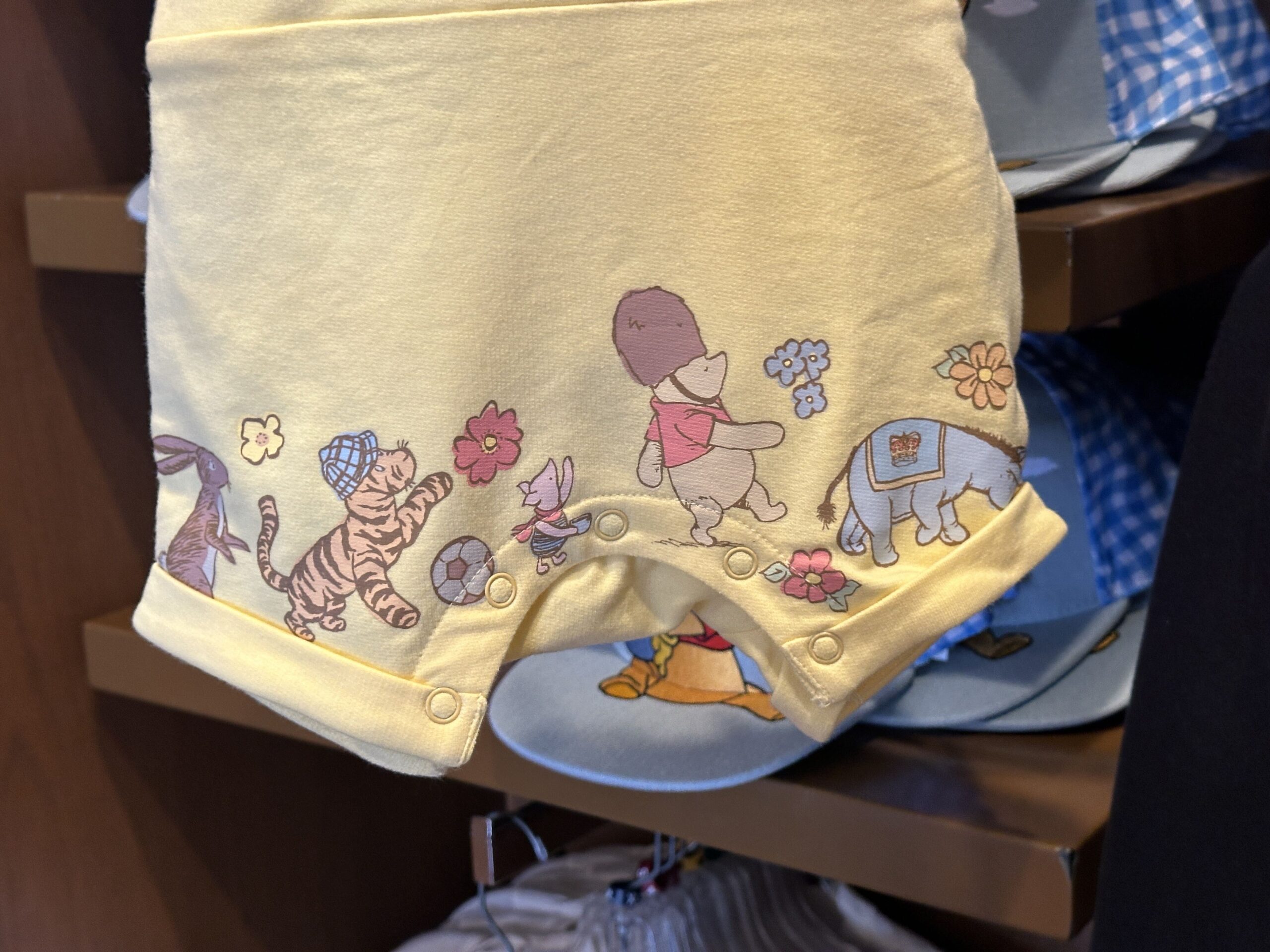 UK Pavilion Winnie the Pooh Baby Onesie.