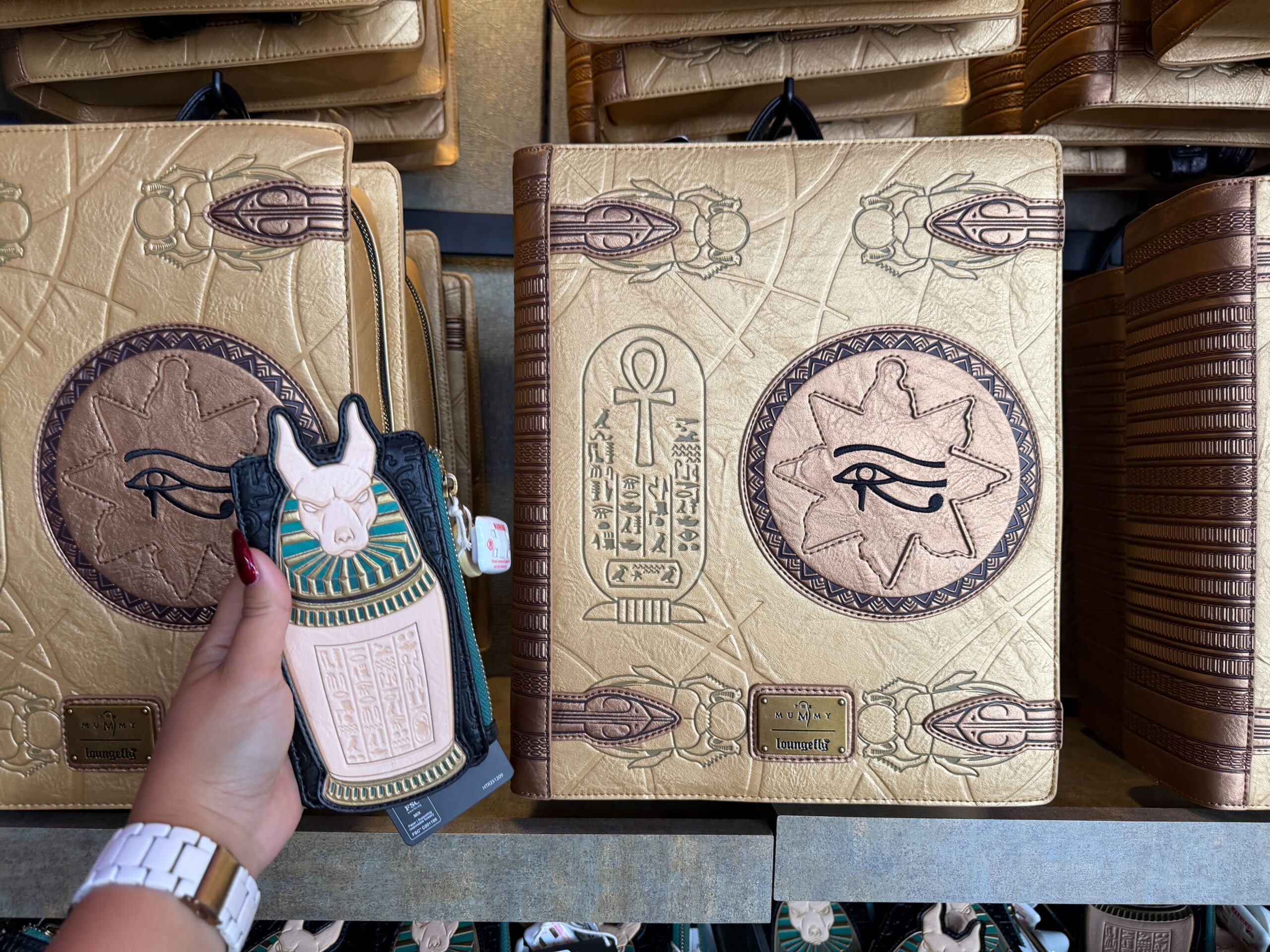 'The Mummy' Loungefly wallet and Golden Book of Amun-Ra backpack at Universal Studios Florida