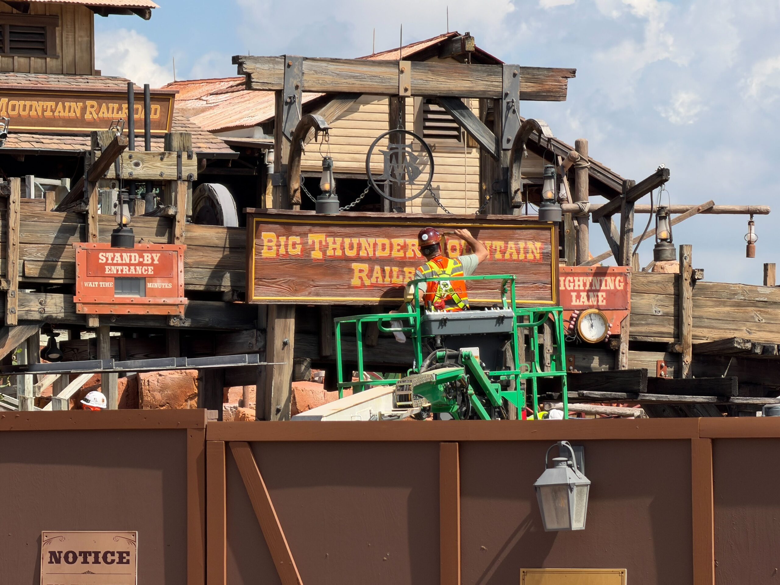It appears the crew was doing paint touch-ups on the sign during installation.