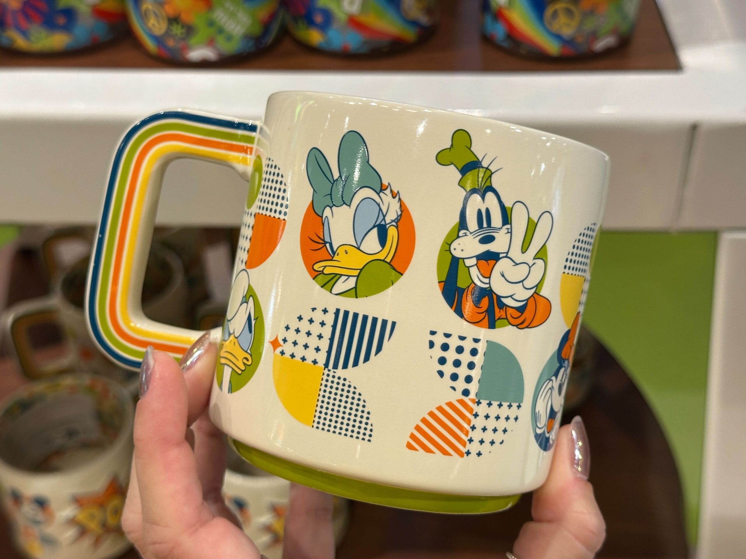 A new Pop Century-specific mug is available at Walt Disney World. It has a retro design and features the Sensational Six.