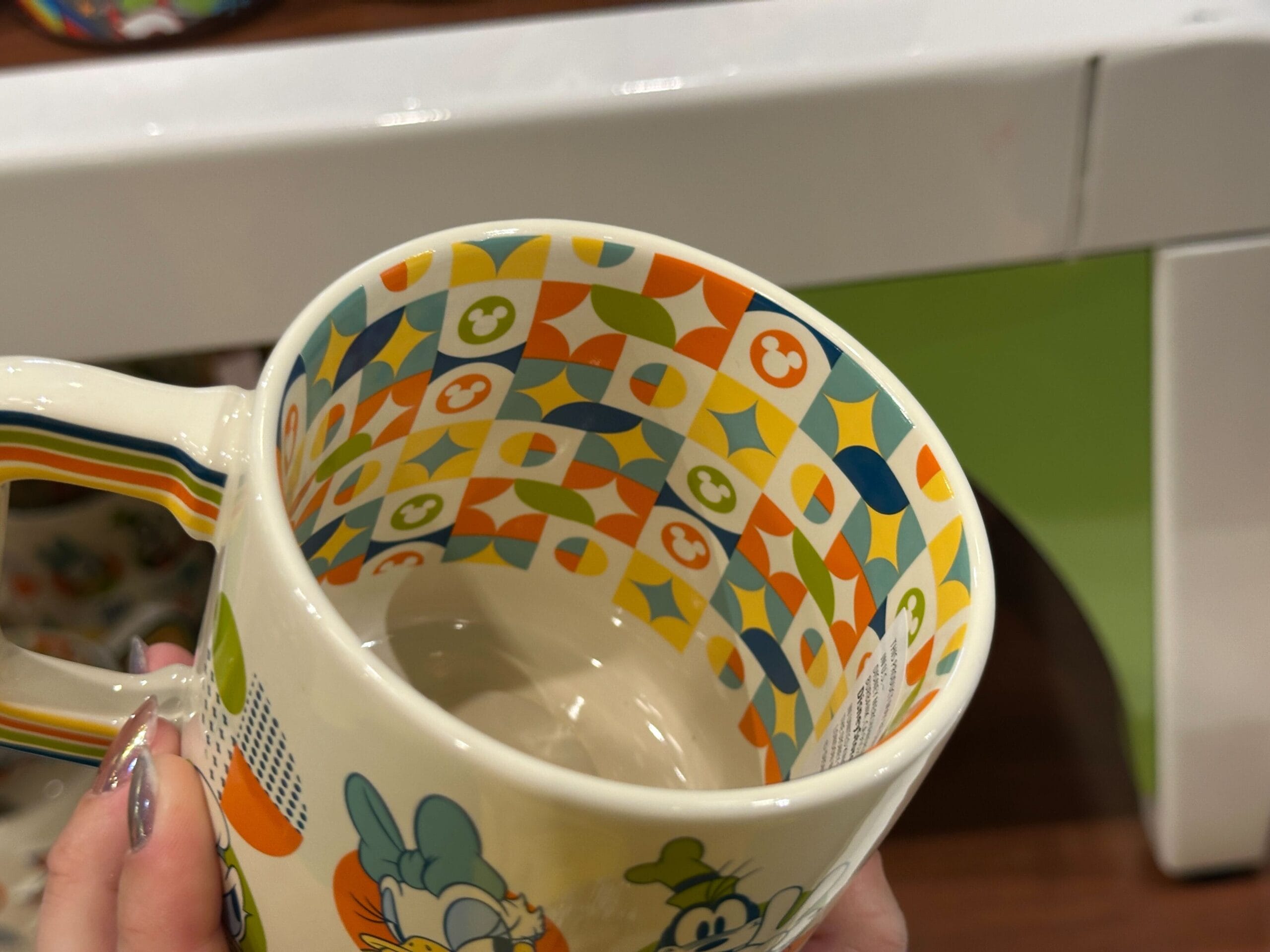 A new Pop Century-specific mug is available at Walt Disney World. It has a retro design and features the Sensational Six.