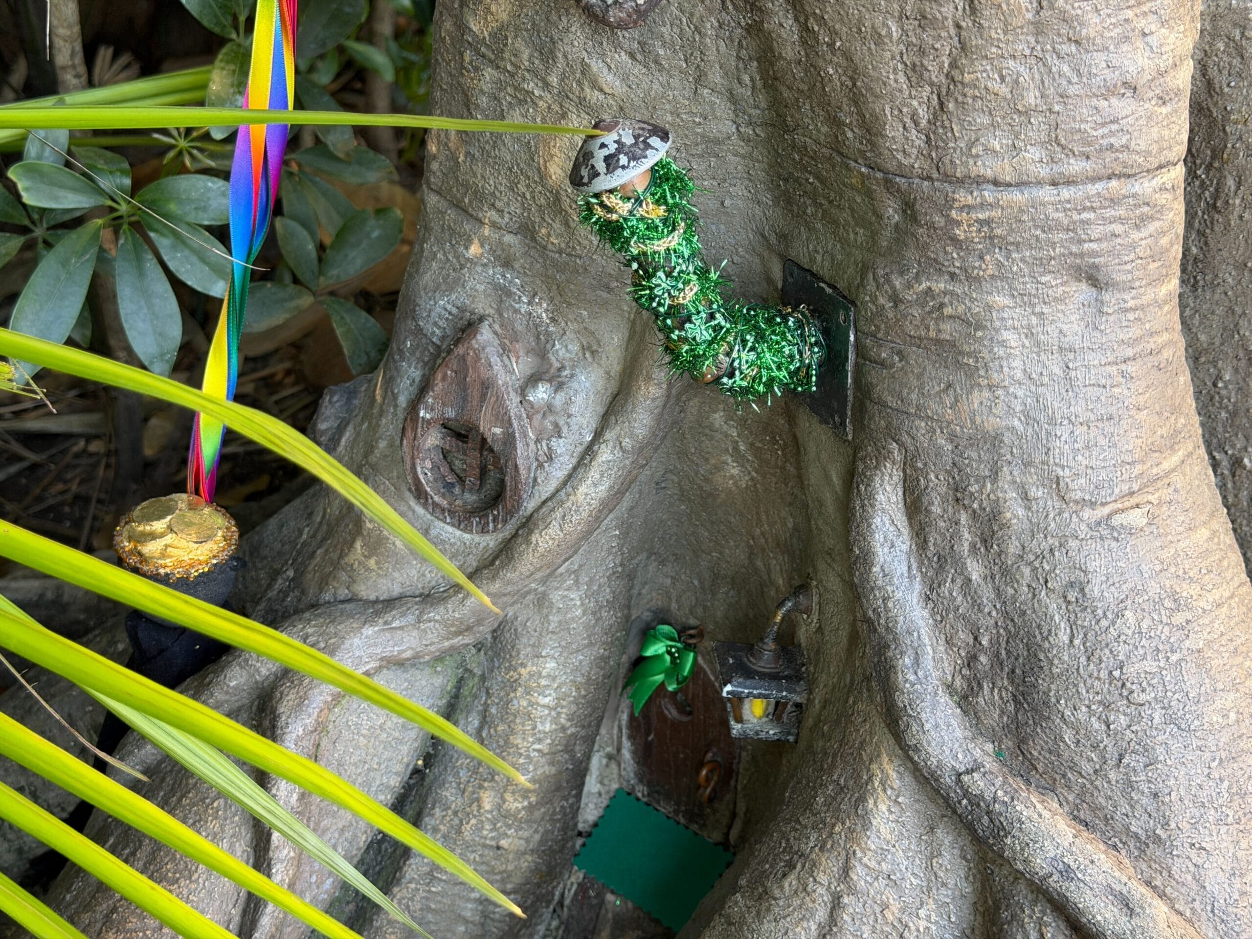 Leprechaun Patrick Begorra's tree home decorated for St. Patrick's Day in Disneyland