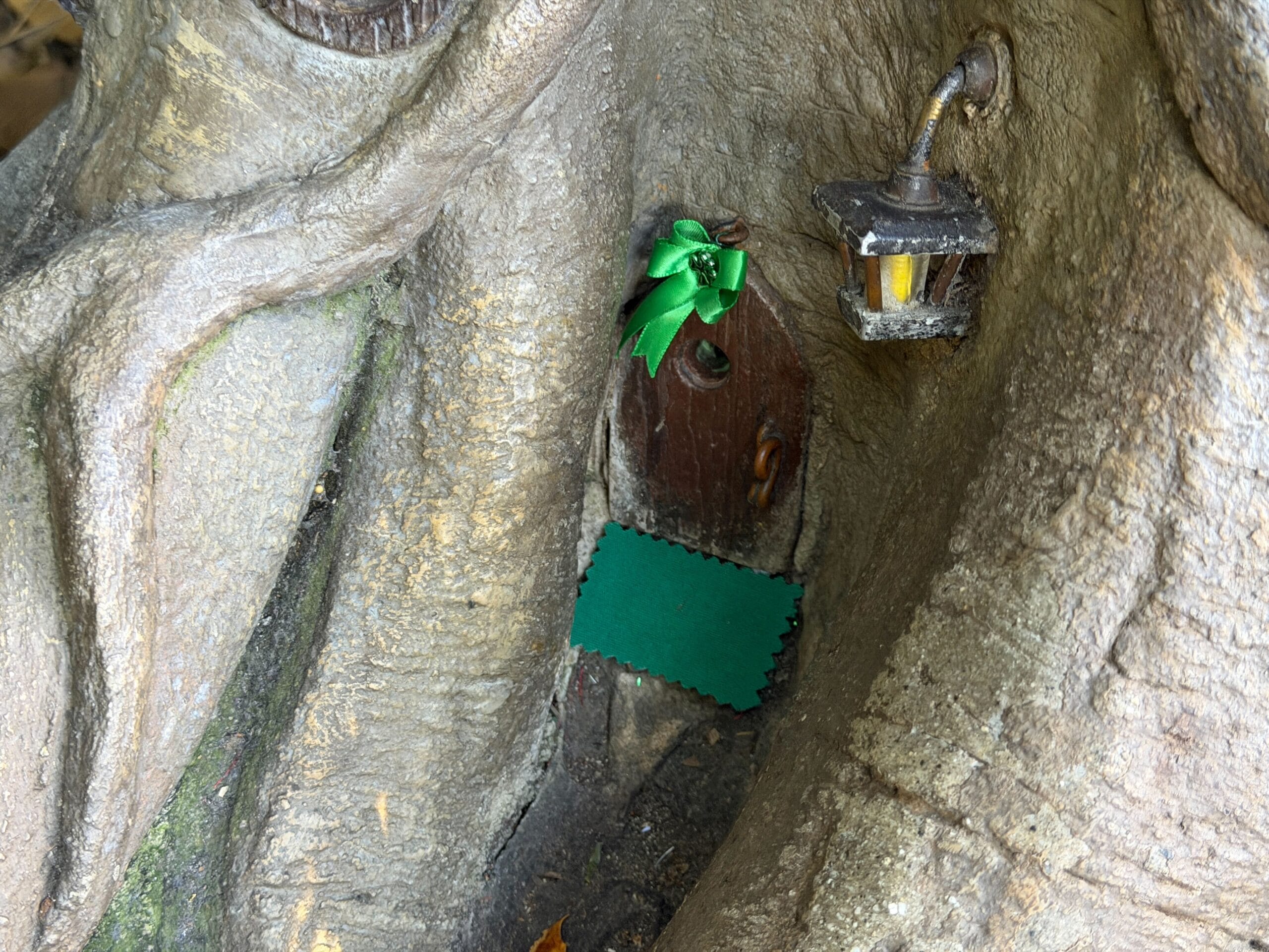 Leprechaun Patrick Begorra's tree home decorated for St. Patrick's Day in Disneyland
