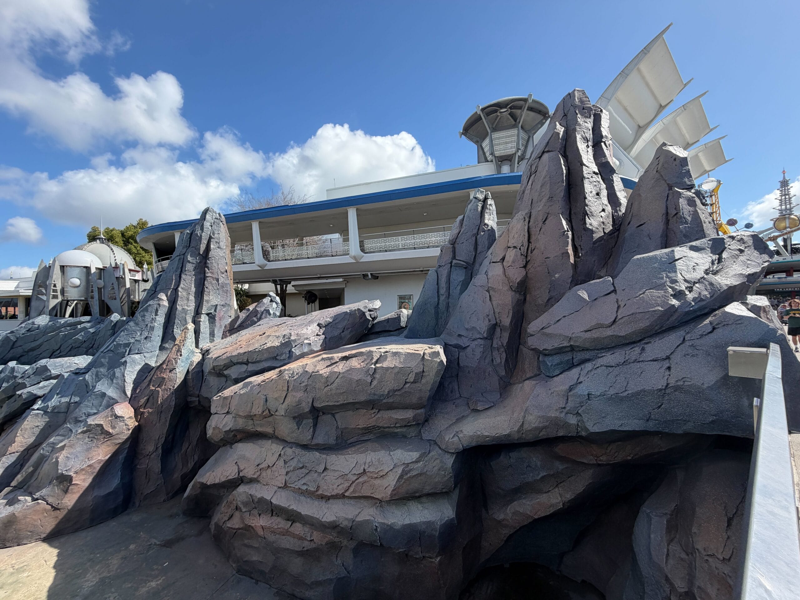 Tomorrowland rocks repainted to metallic blue in Magic Kingdom at Walt Disney World
