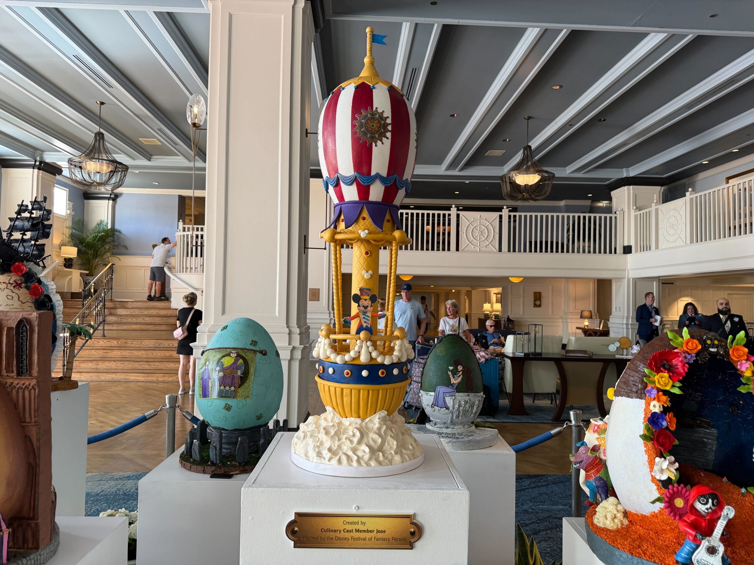 The second egg draws its inspiration from the 'Festival of Fantasy' parade at the Magic Kingdom, namely the final float where Mickey and Minnie stand in a giant hot air balloon.
