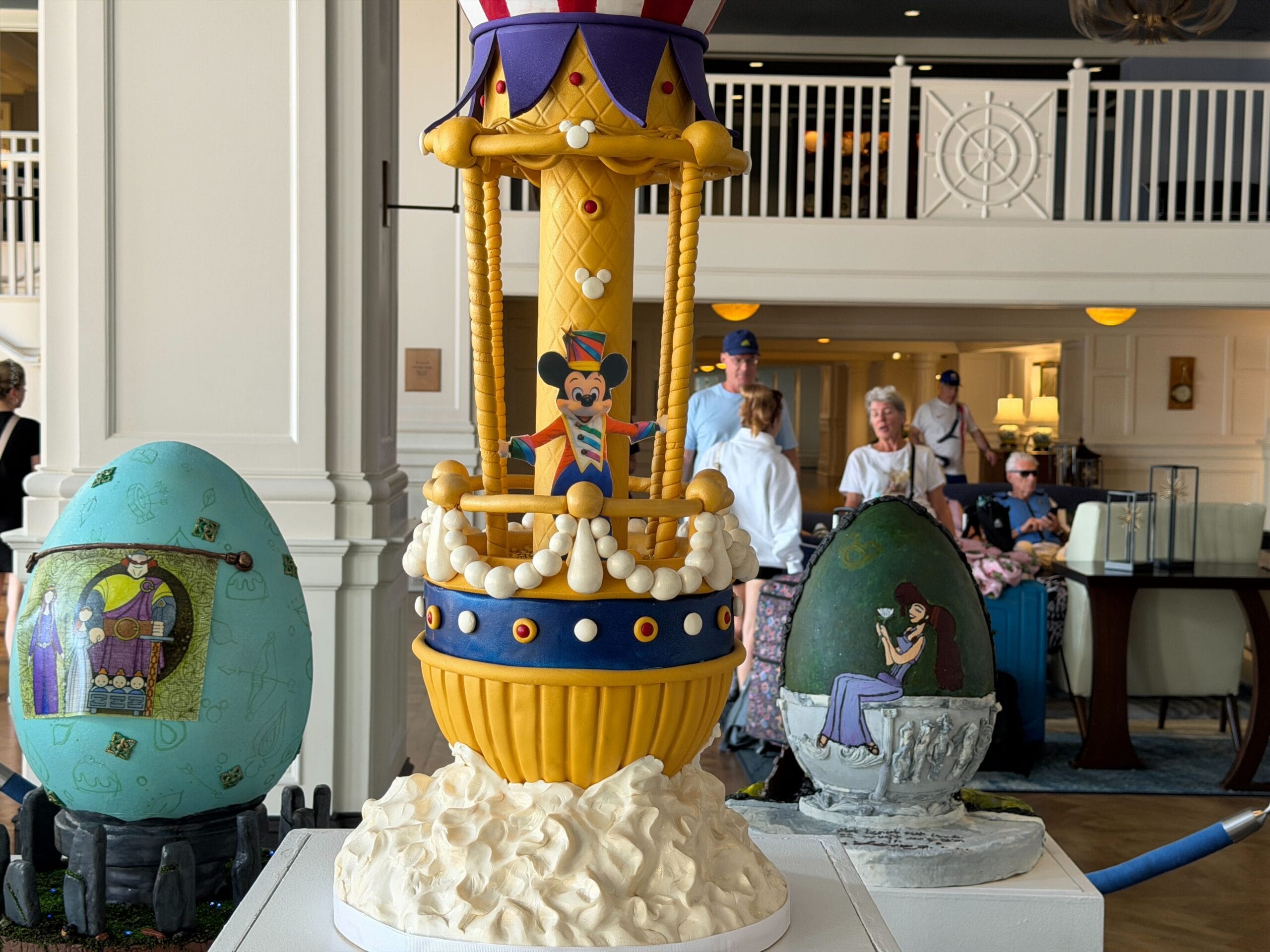 The second egg draws its inspiration from the 'Festival of Fantasy' parade at the Magic Kingdom, namely the final float where Mickey and Minnie stand in a giant hot air balloon.