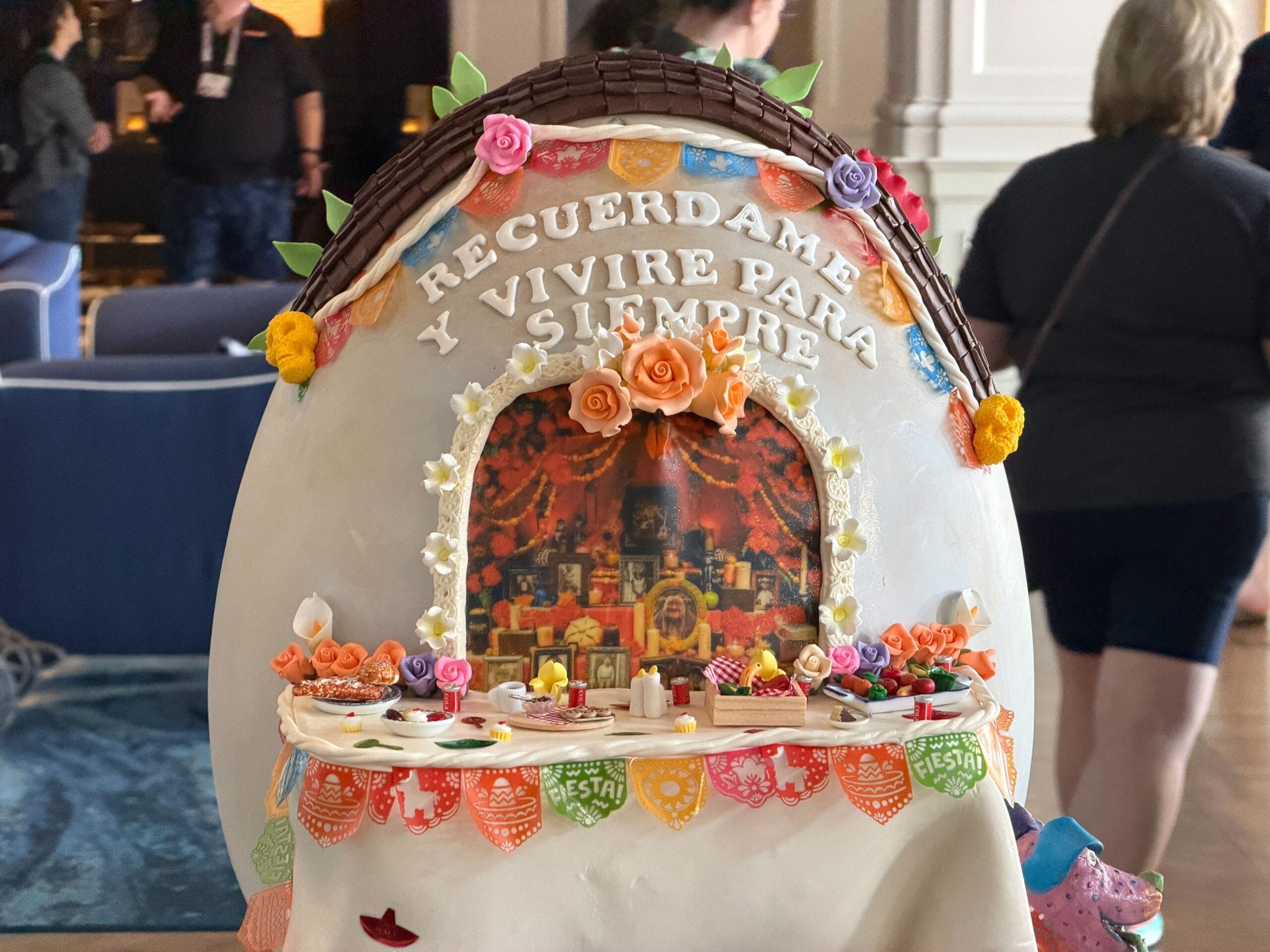 The other half is a display reminiscent of the ofrenda in the film. Recuérdame y viviré para siempre, which roughly translates to 'Remember me and I will live forever.'