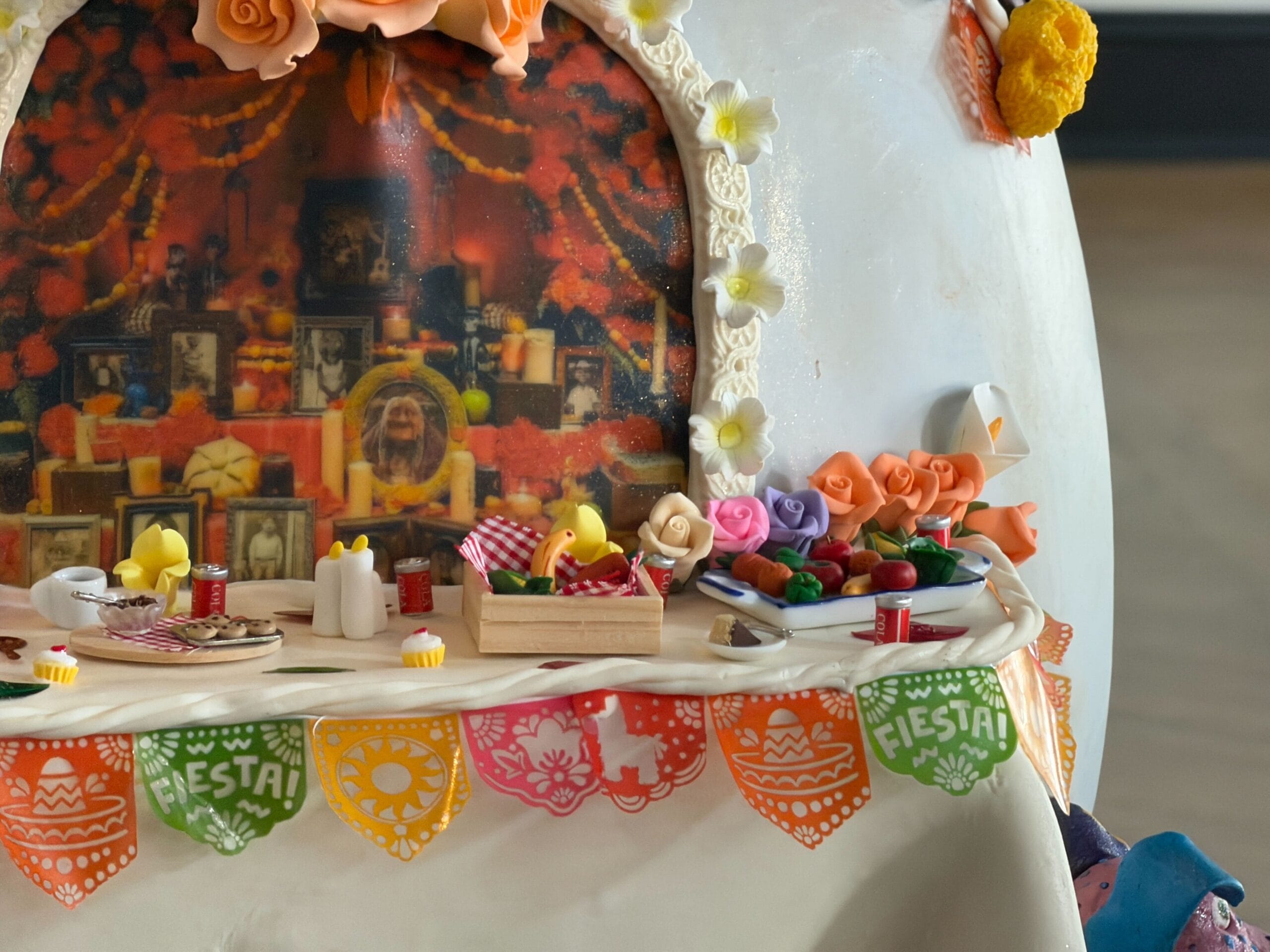 The other half is a display reminiscent of the ofrenda in the film. Recuérdame y viviré para siempre, which roughly translates to 'Remember me and I will live forever.'