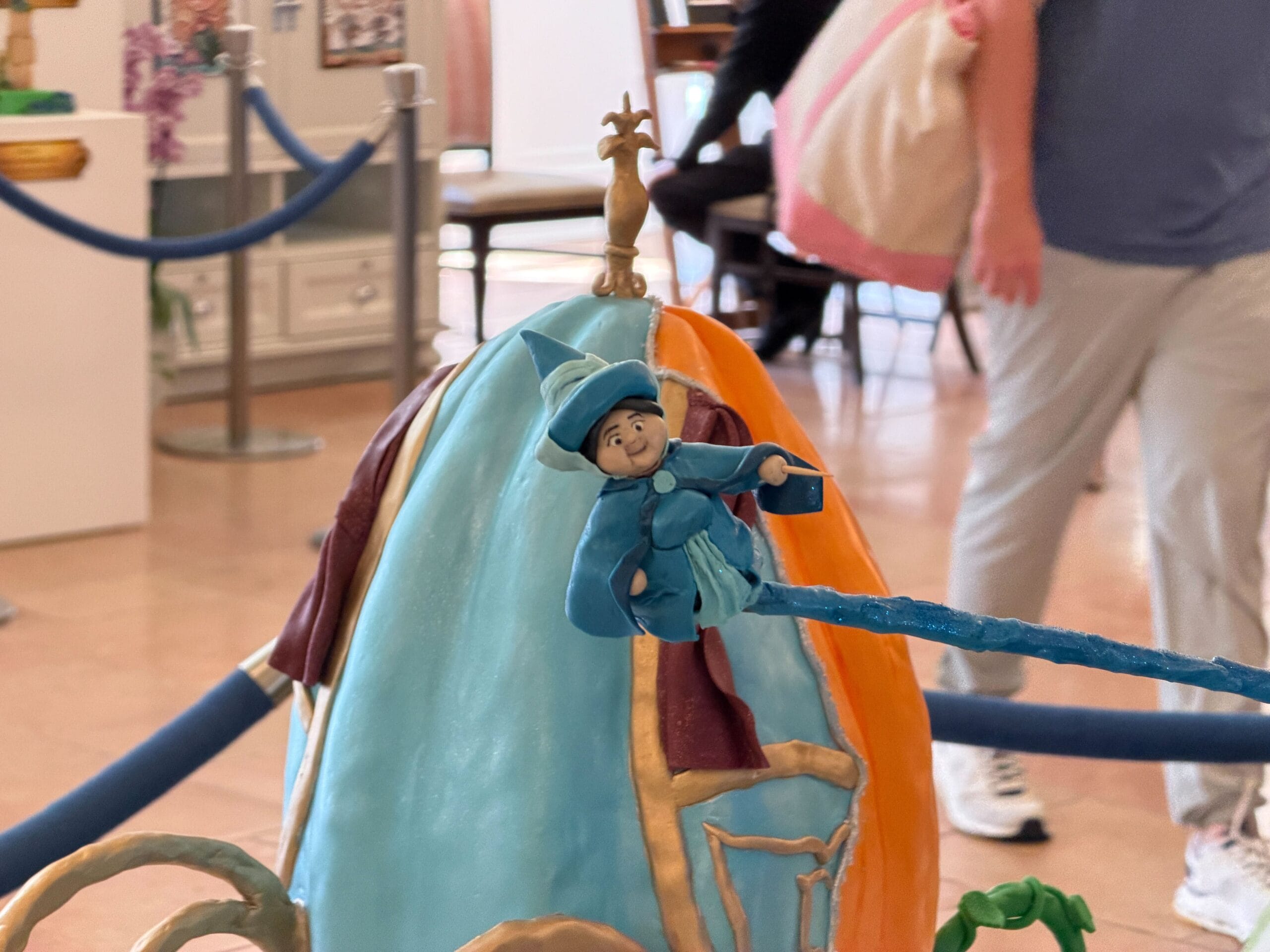 The last egg (if you can call it that) is Aurora's dress from Sleeping Beauty, split unevenly between pink and blue. Make it pink! and Make it blue! is written all around the base, while the storybook leans against the dress.