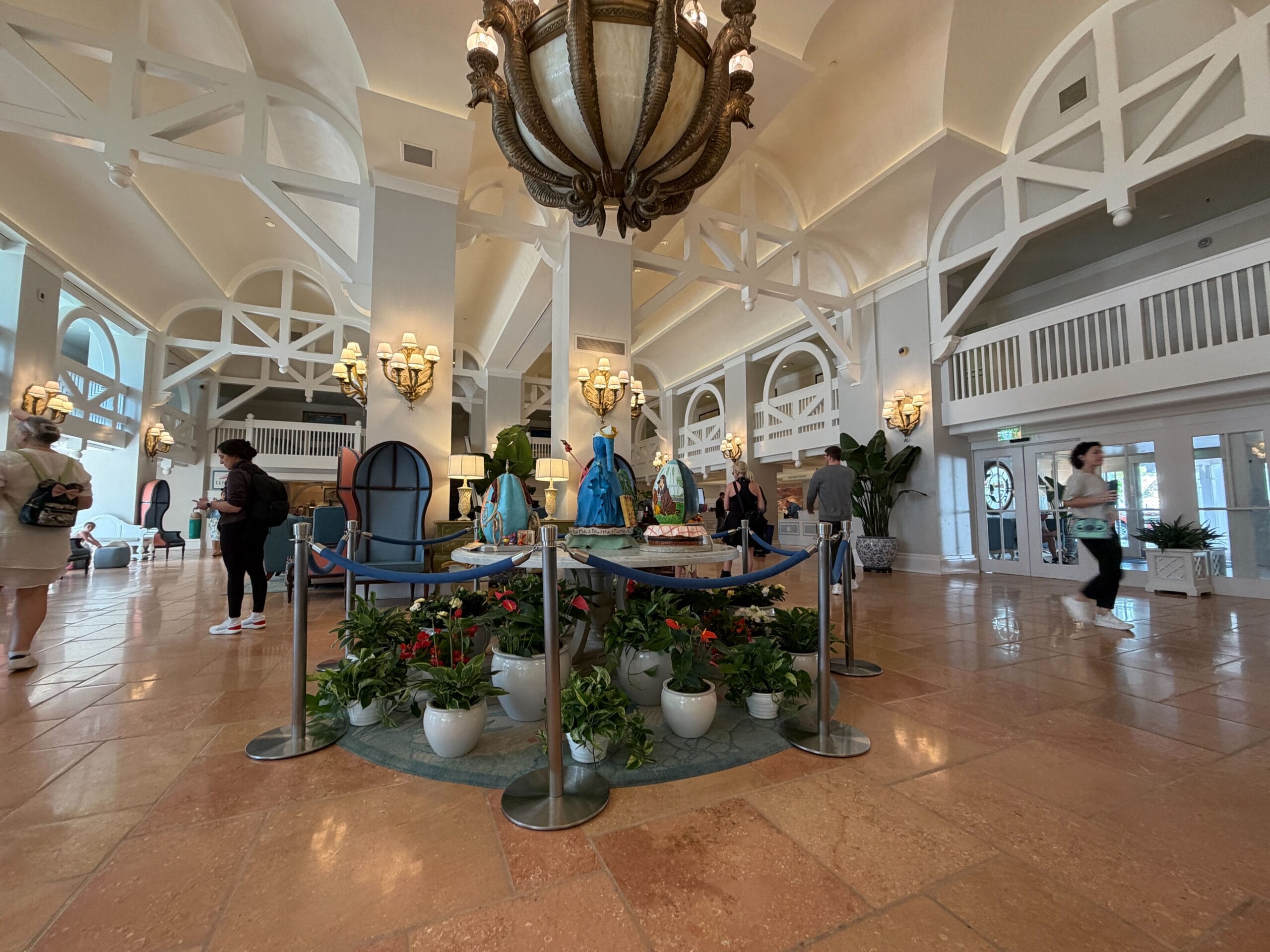 Over at Disney’s Yacht Club Resort, a similar display features ten more eggs inspired by Disney animated films, characters, and the resort itself, though these are spread out across a three different places in the lobby.