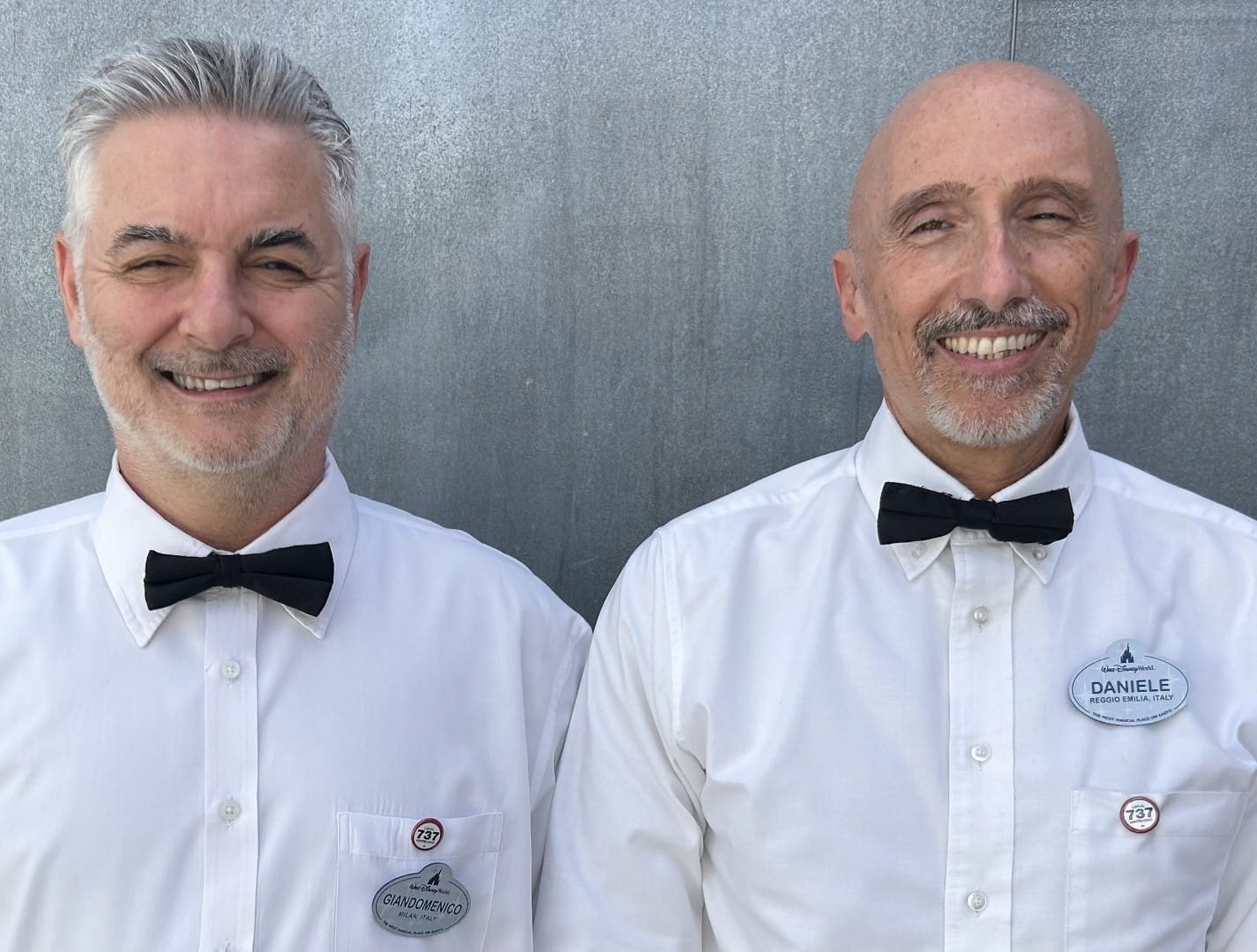 Union workers restore their UNITE HERE 737 buttons at Italy Pavilion
