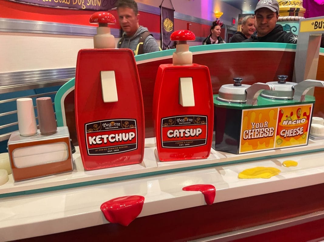 Faux condiment pumps in the movie theater queue for Mickey & Minnie's Runaway Railway in Toontown in Disneyland