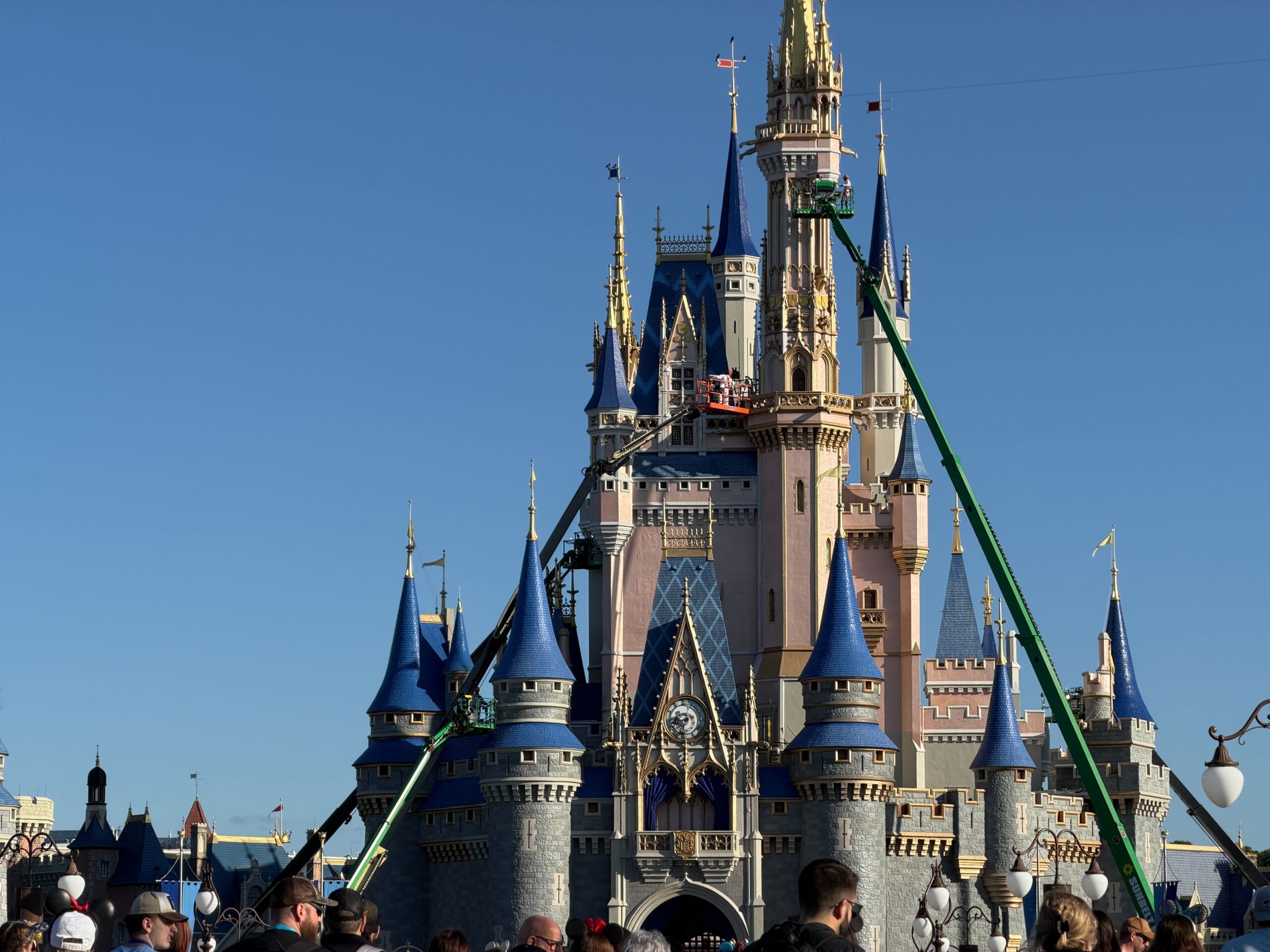 Crews Begin Painting Tallest Tower of Cinderella Castle at Magic Kingdom