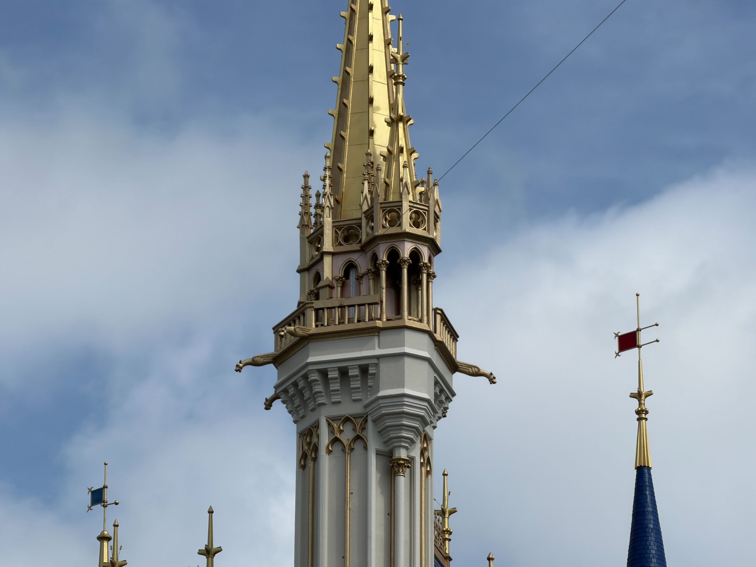 The walls on the balcony of the tallest tower of Cinderella Castle remain pale pink.