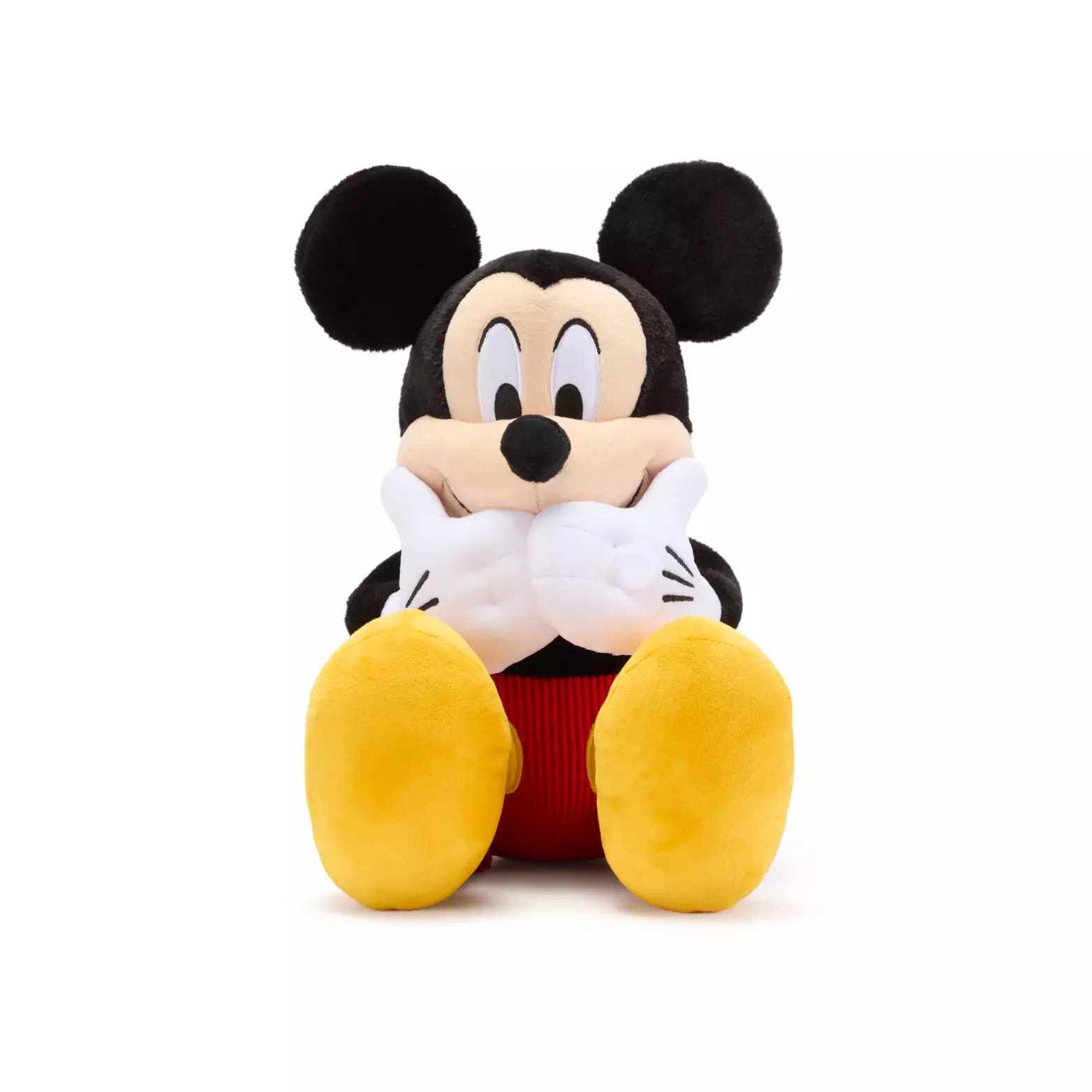 The Mickey battery-operated plush also holds his hands in front of his face. The left gloved hand has a button that allows the plush to wiggle and giggle. He is wearing his yellow shoes and red shorts with oval yellow buttons. This plush is rated for kids aged 2+.