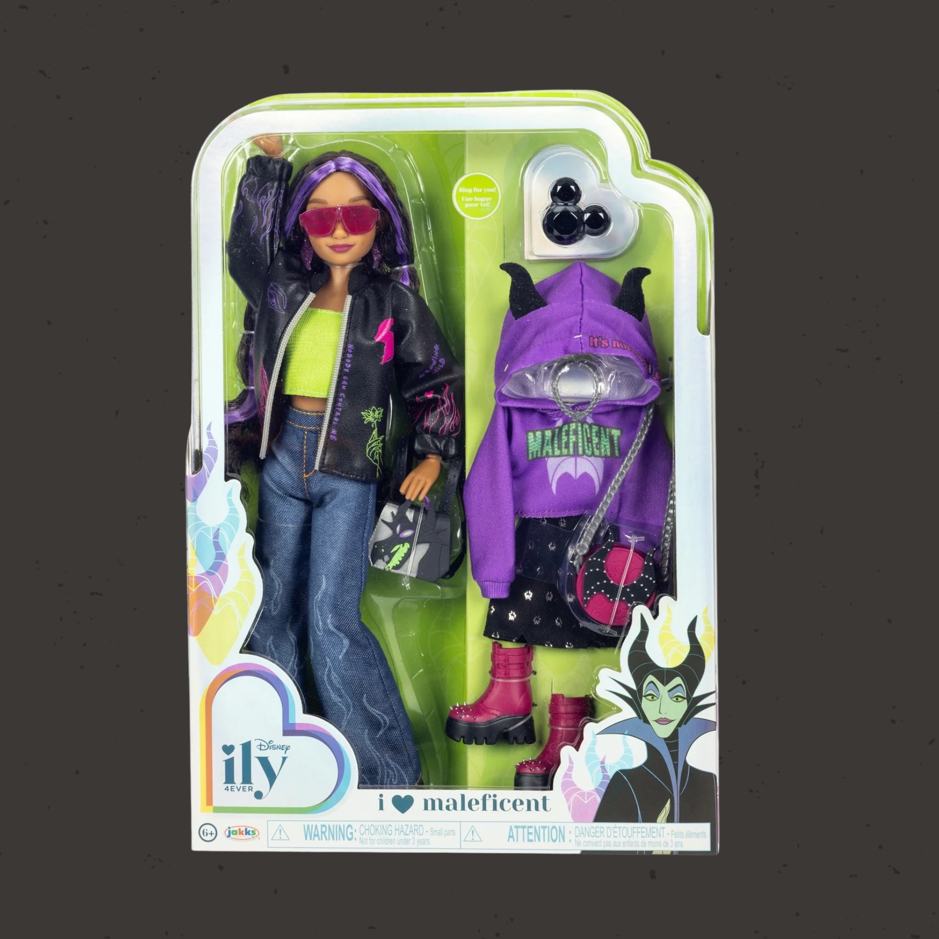 This ily 4ever fashion doll is themed after Maleficent. The doll has purple and black hair, a Maleficent dragon purse, another purse of her horns, and even a purple jacket that says "Maleficent" on the back.