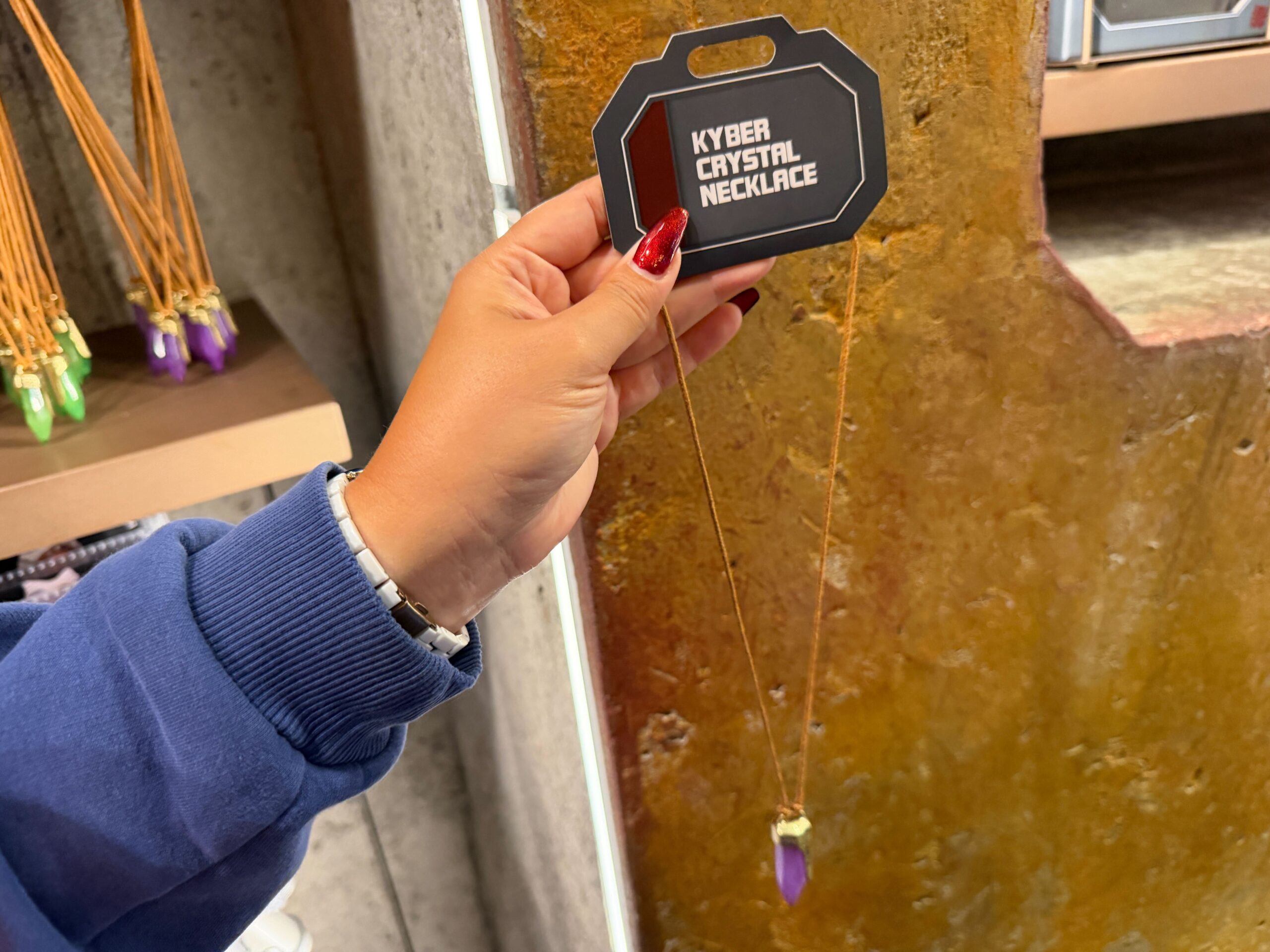 Purple kyber crystal necklace in Star Wars: Galaxy's Edge at Disney's Hollywood Studios in Walt Disney World