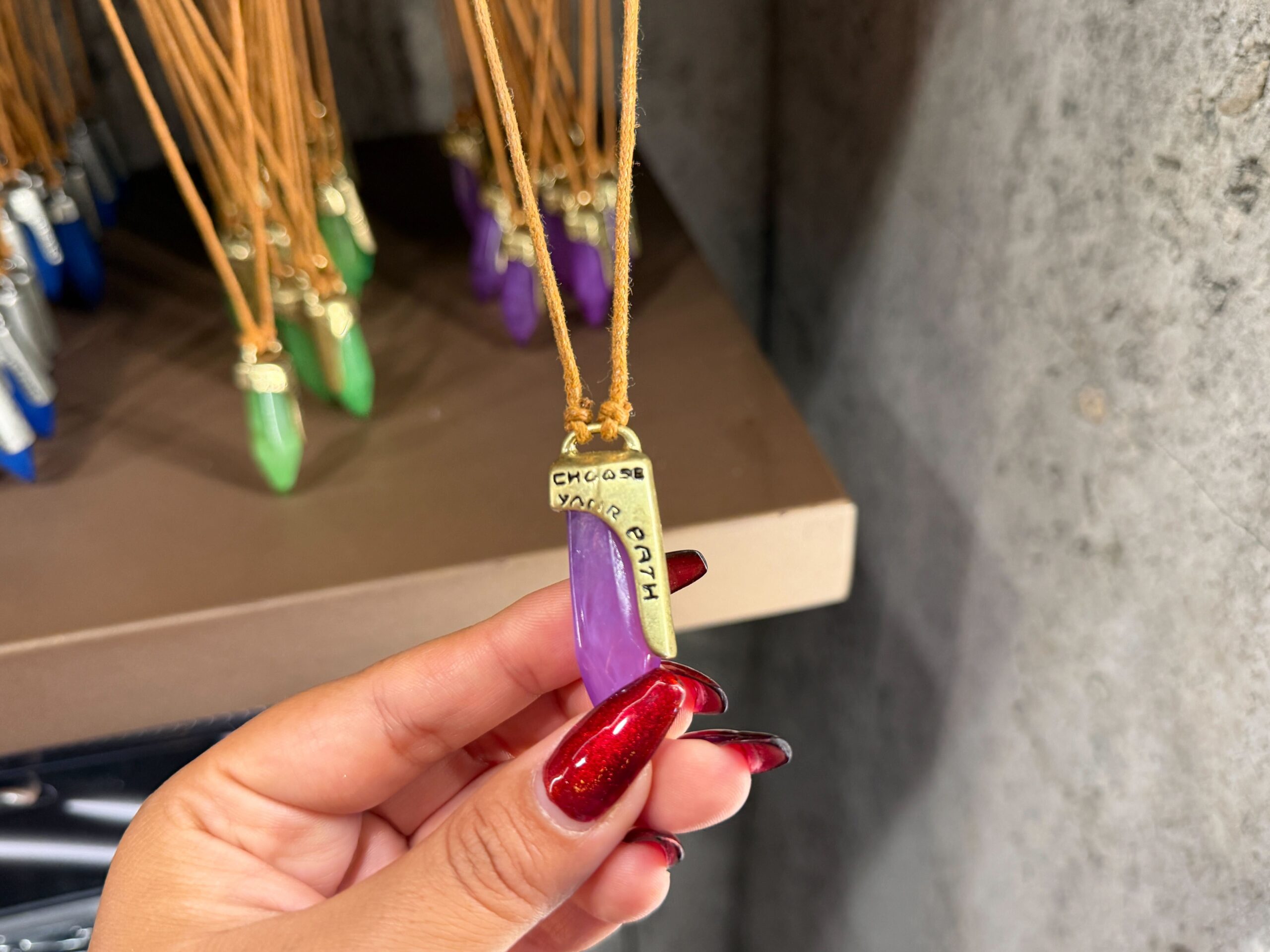 Purple kyber crystal necklace in Star Wars: Galaxy's Edge at Disney's Hollywood Studios in Walt Disney World