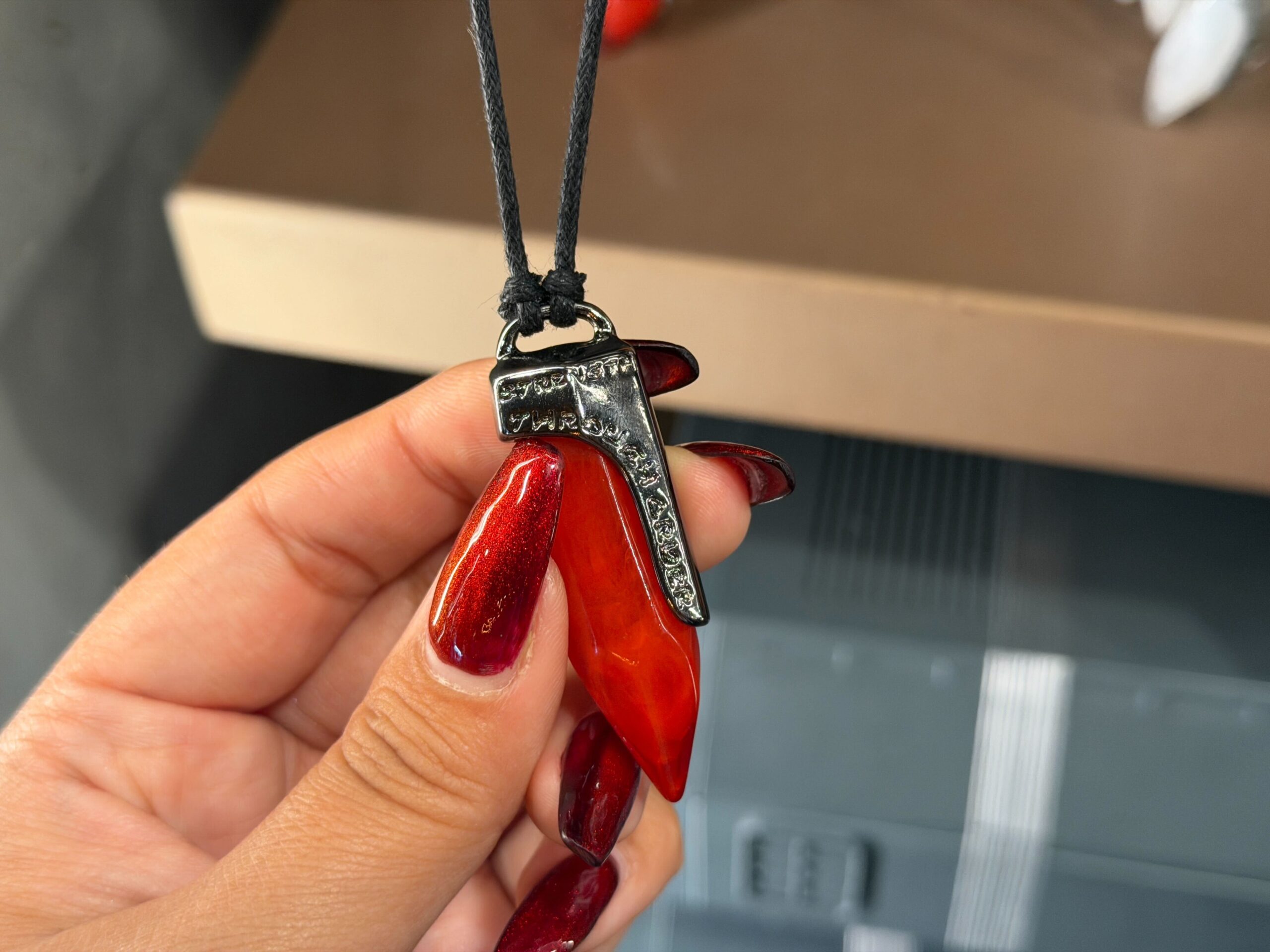 Red kyber crystal necklace in Star Wars: Galaxy's Edge at Disney's Hollywood Studios in Walt Disney World