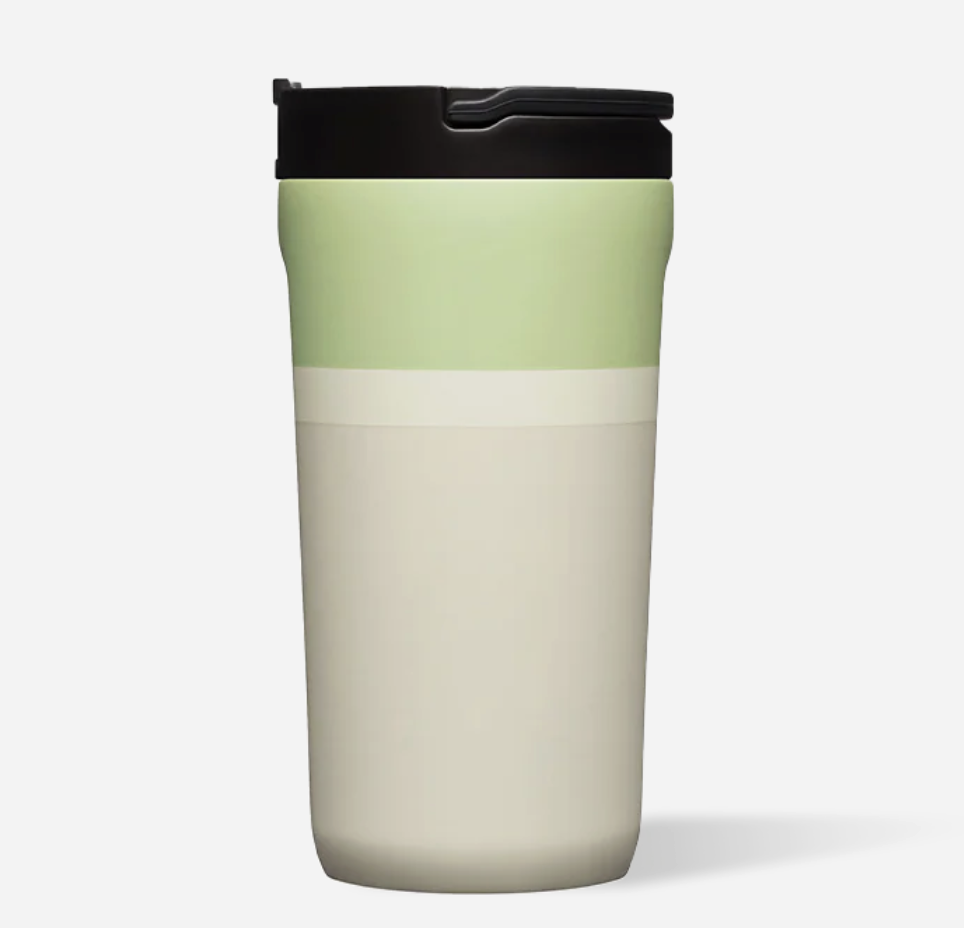 This tri-tone cup has a pale green at the top with eggshell and tan beneath it. It represents Grogu (or Baby Yoda) wearing his robe with a fleece collar.