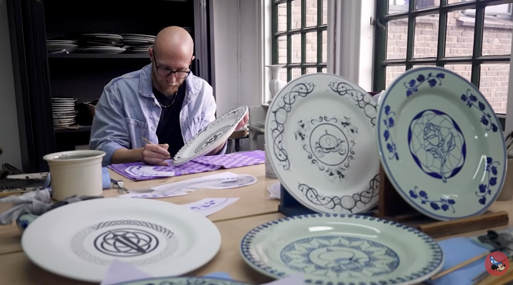 Bowie goes on to explain that the nine plates on display inside the restaurant are one of his favorite details at Regal View. Each represents a different princess and, he says, was done in collaboration with the graphics team at Walt Disney Animation Studios and Royal Delft, a renowned Norwegian pottery company.