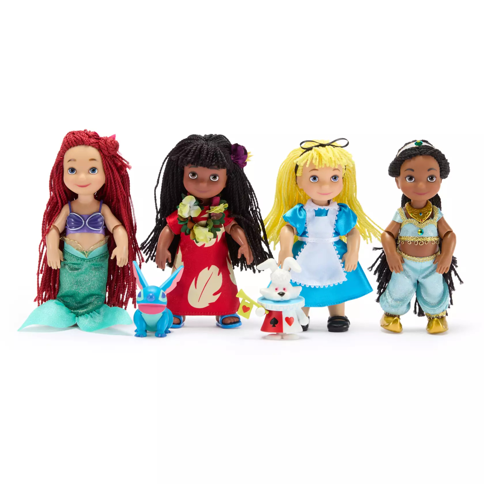 The doll set includes Ariel, Lilo, Stitch, Alice, the White Rabbit, and Jasmine. These dolls are found in various scenes of Disneyland’s version of the attraction, which were added beginning in 2008. The dolls are 5 1/2" tall.